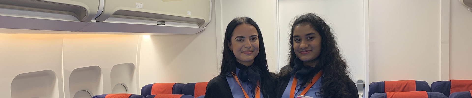 Two students in the air cabin at the City Hub