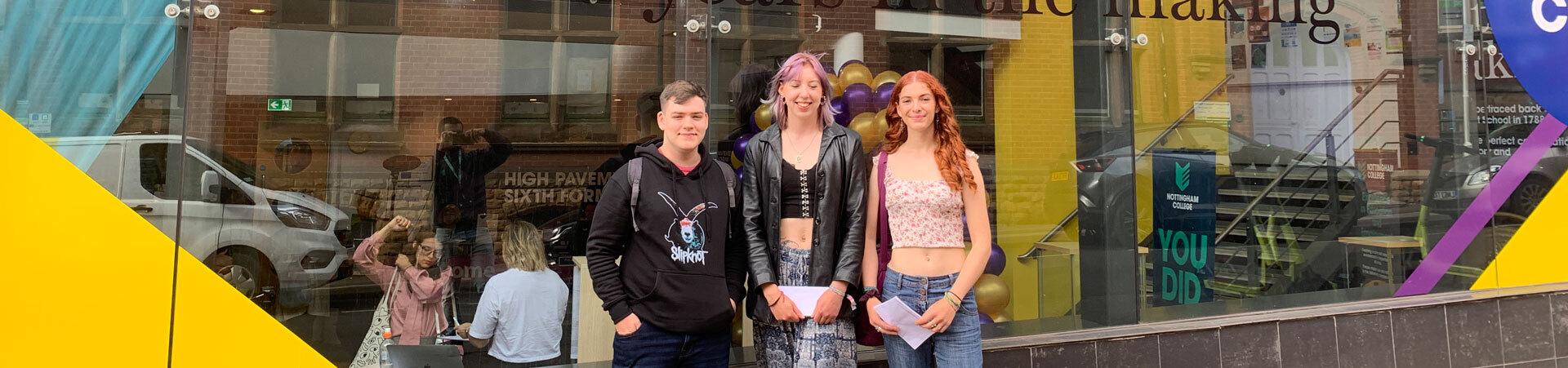 Students standing outside High Pavement in front of glass window