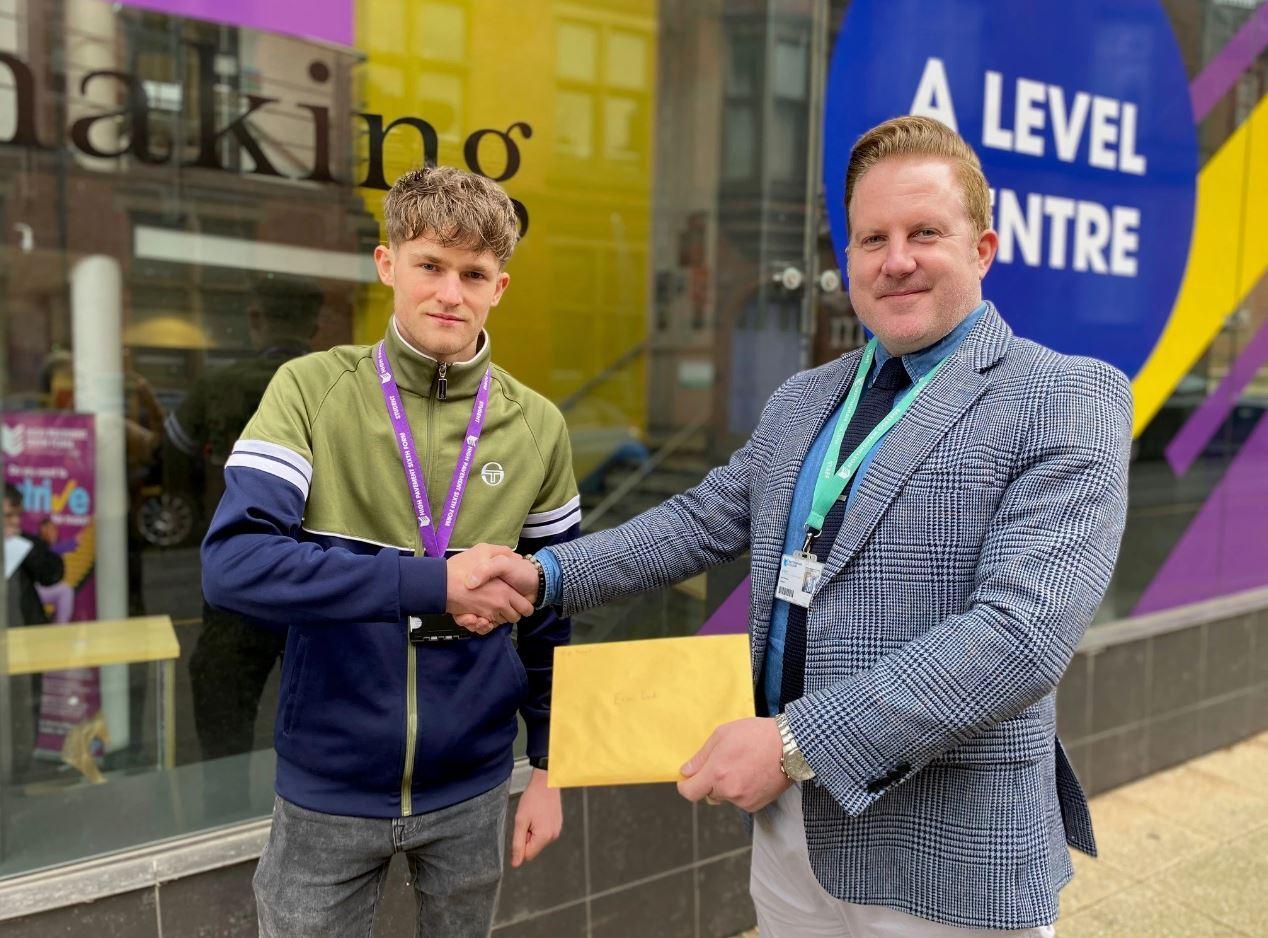 Evan with a member of staff outside the High Pavement Sixth Centre