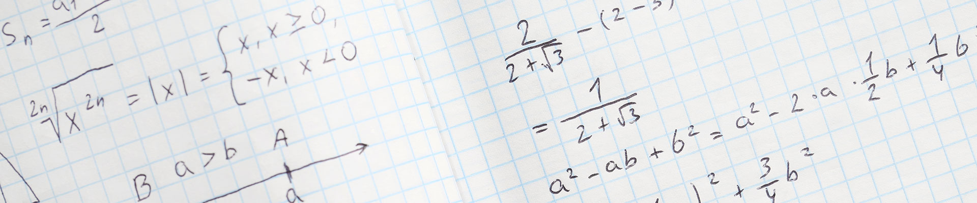 An exercise book with handwritten formulas