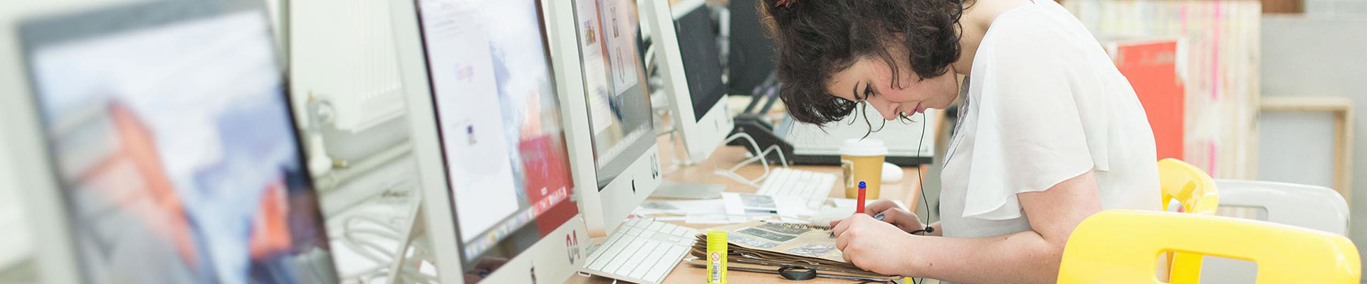 A student working in an art studio at the Adams Building.