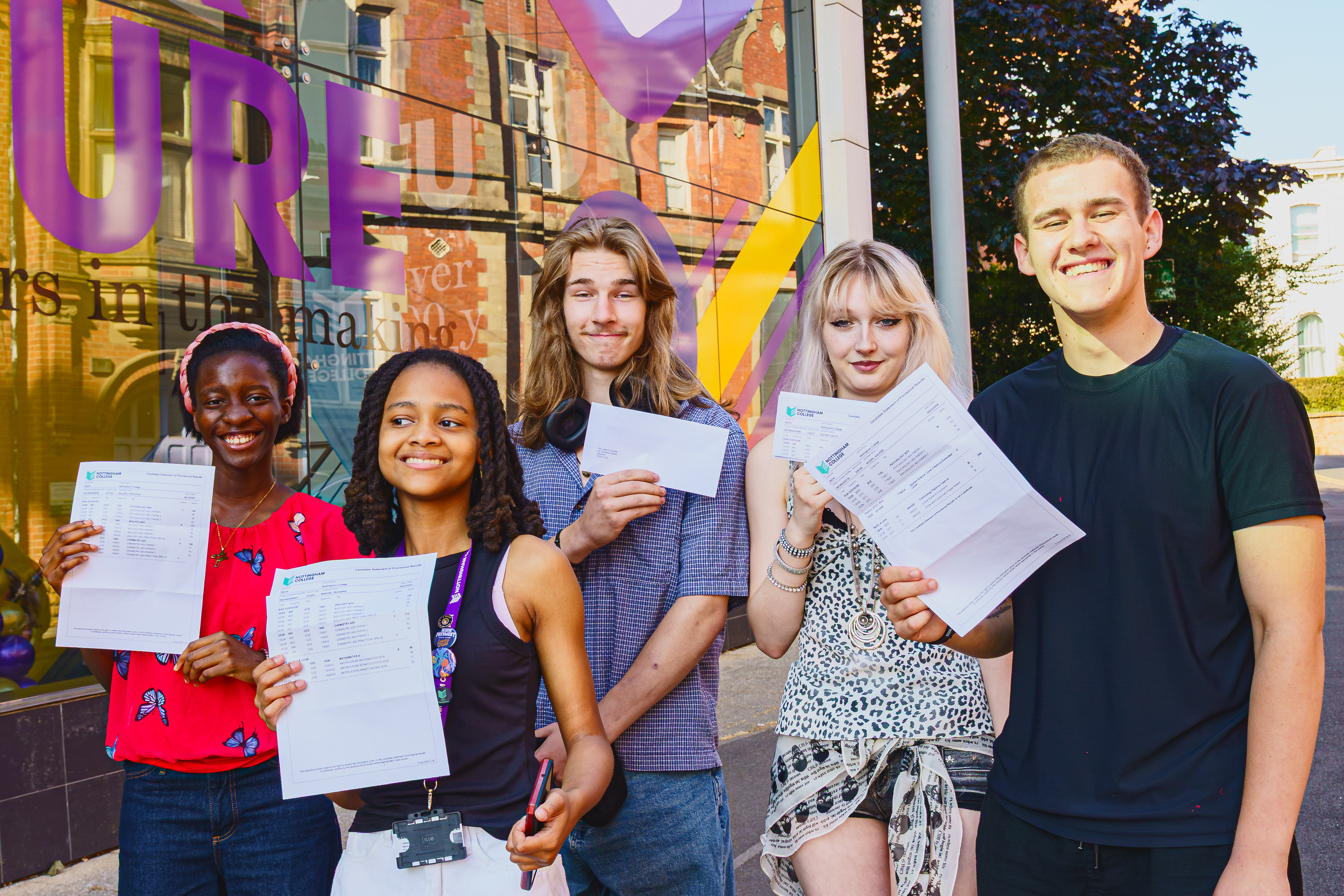 Students pose with their results