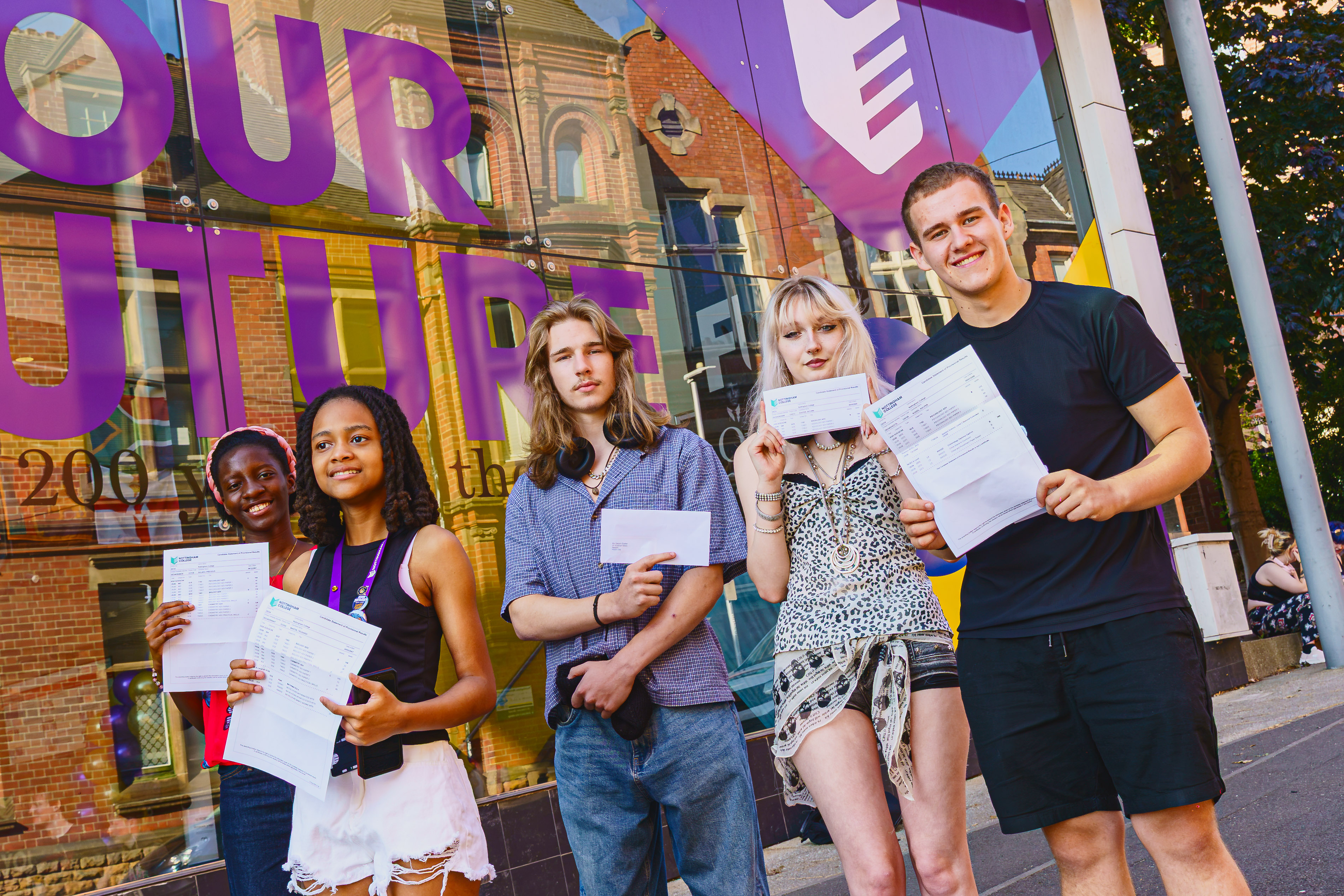Students pose with their results