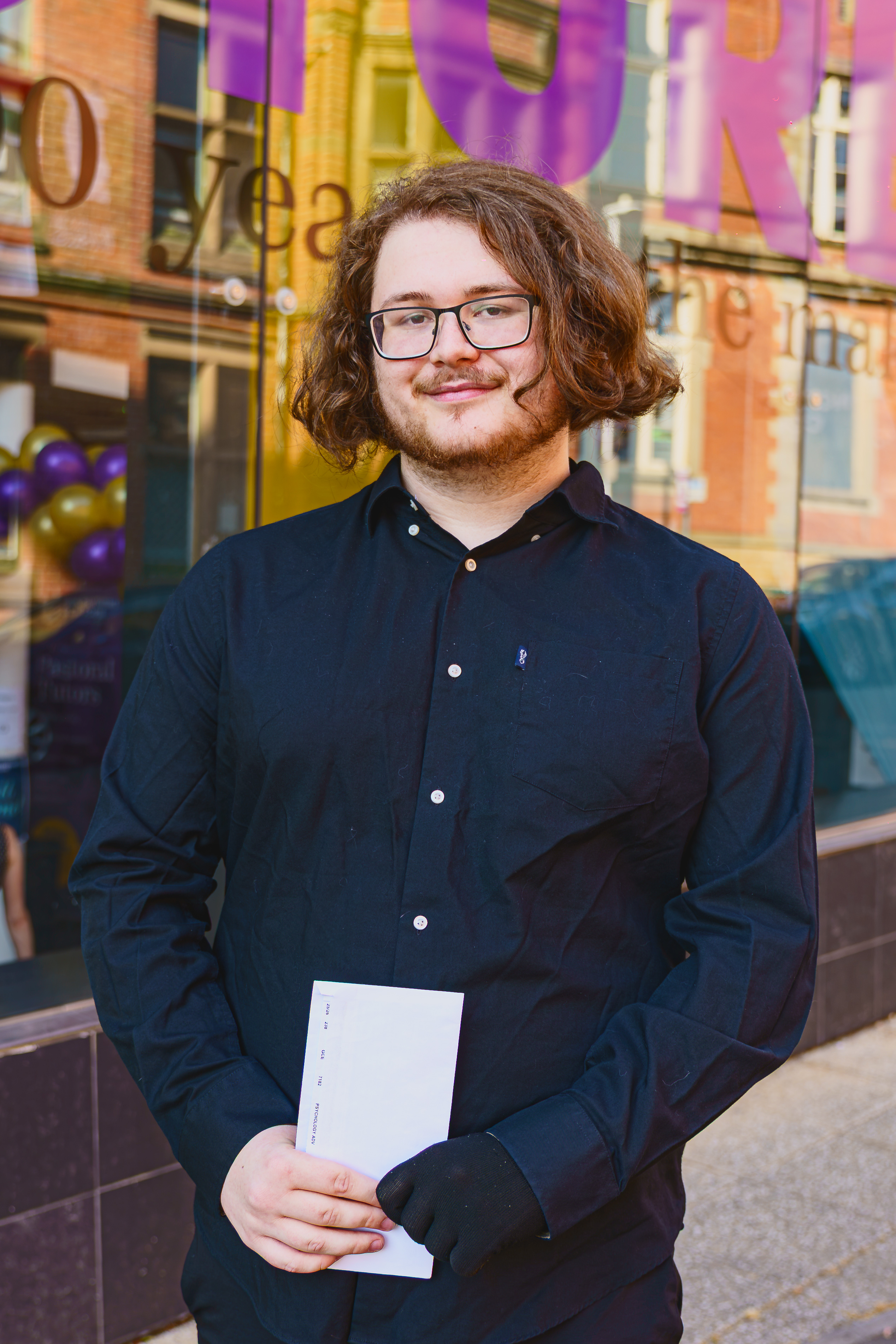 Lloyd Berry smiling with his results