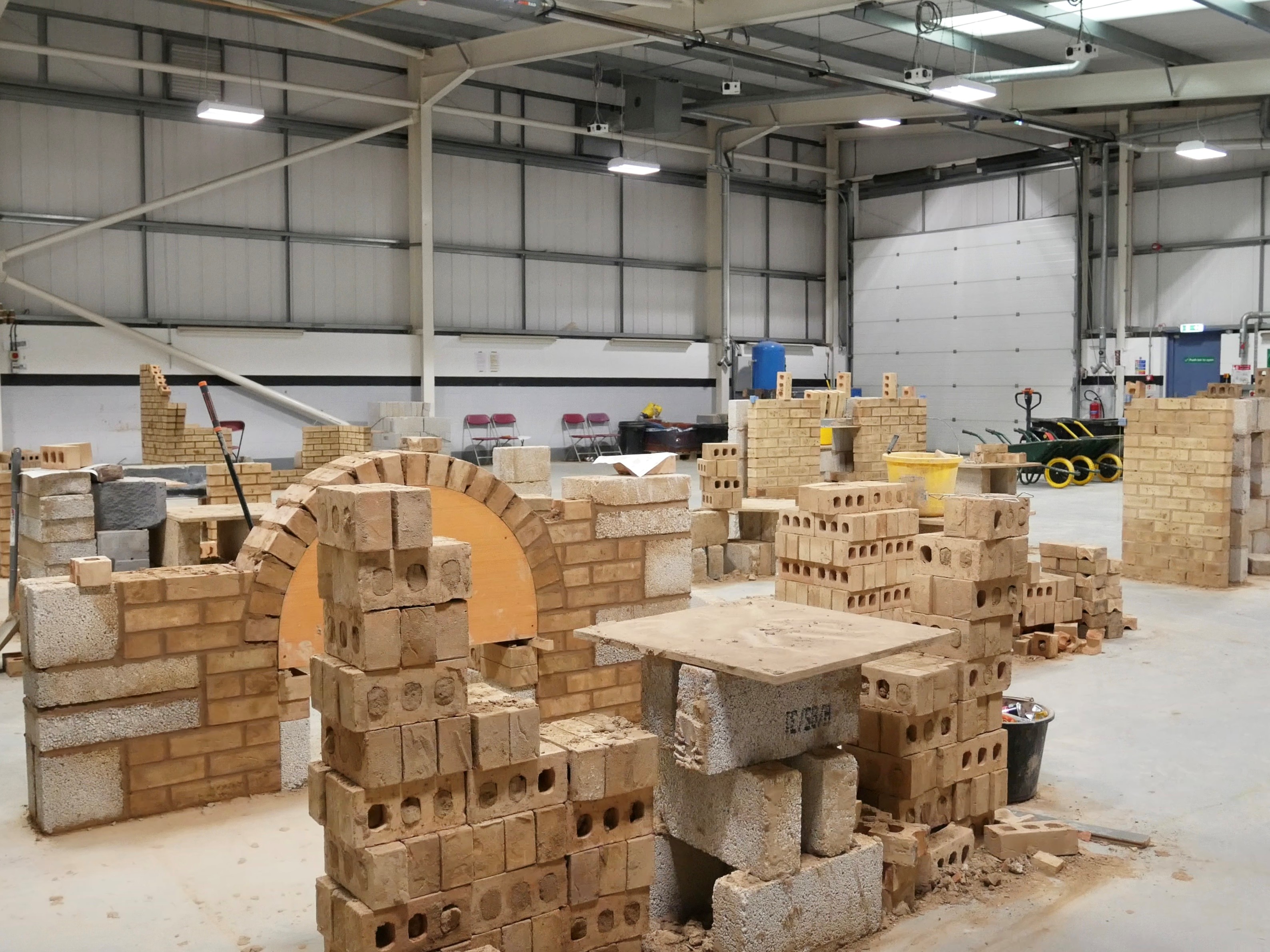 Inside the building, shot of bricklaying practice
