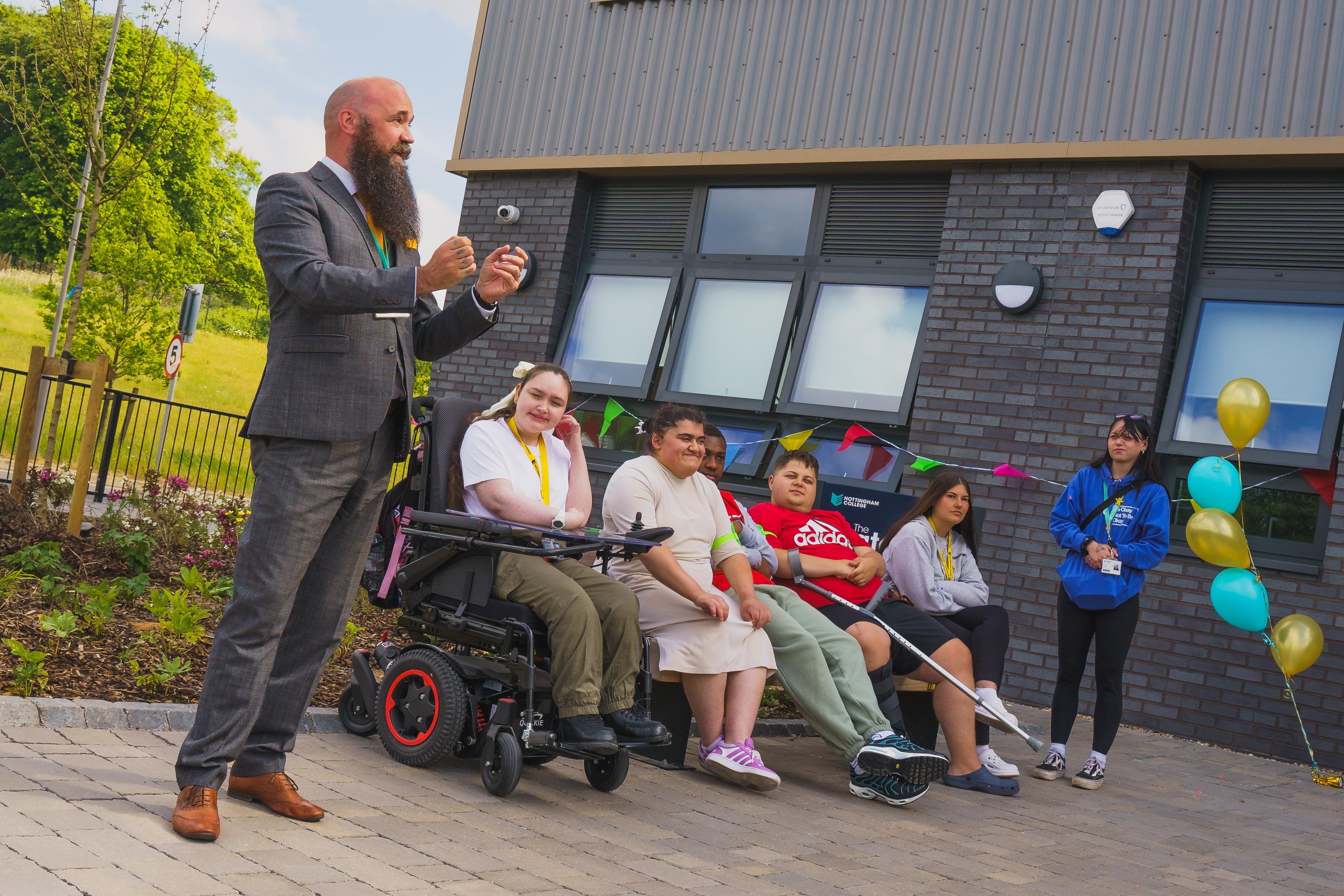 Carl Ara speaking to guests