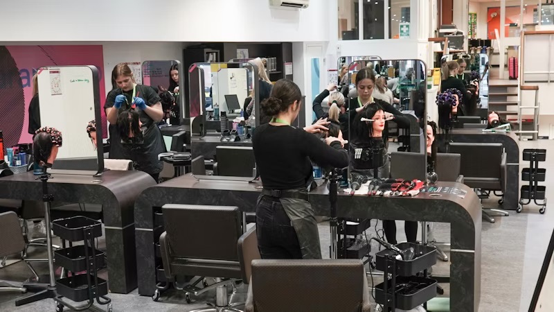 Students working in the Wheeler Gate salon