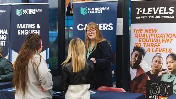 Careers team at an event talking to people.
