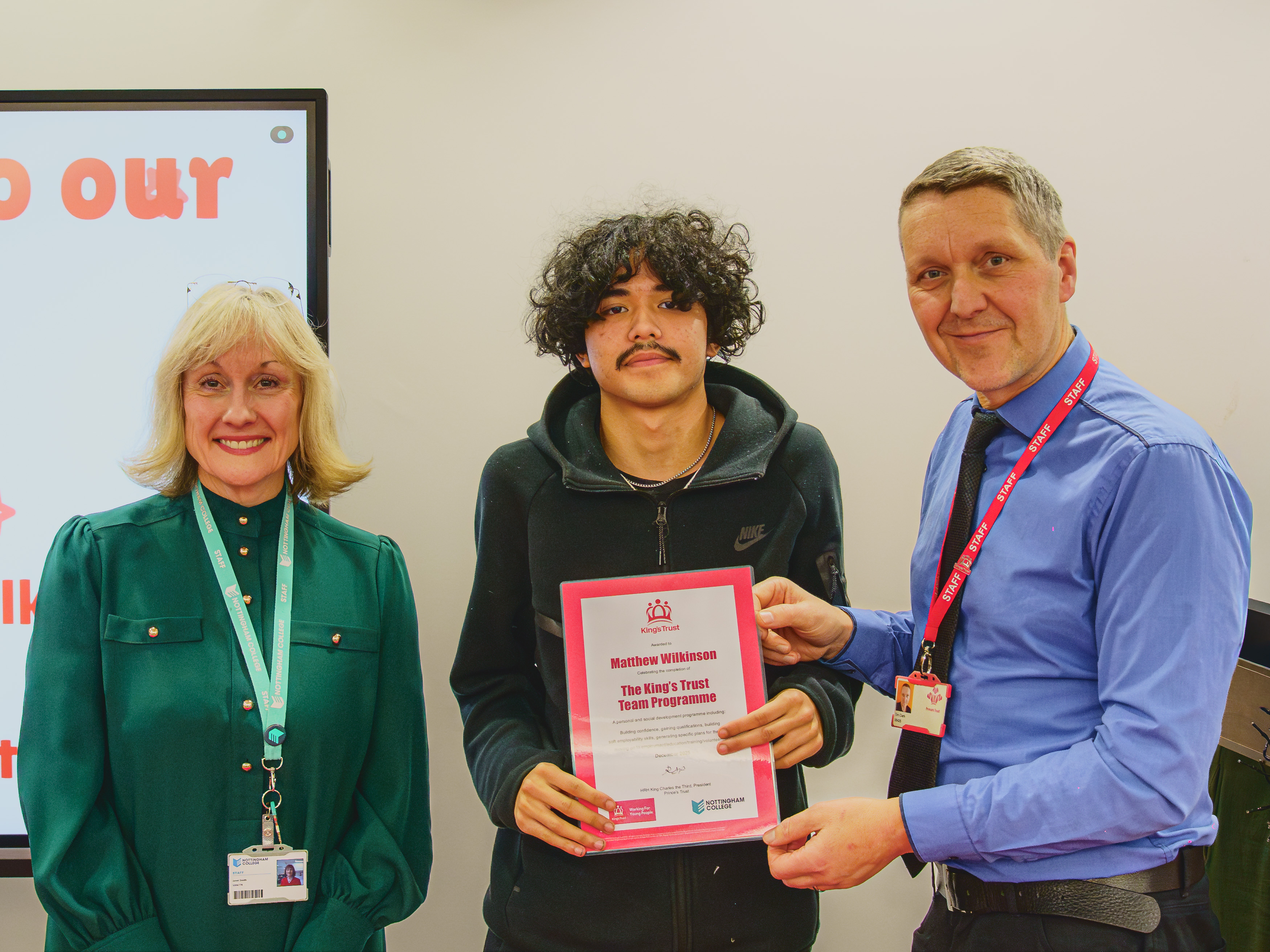 Matthew at his Kings Trust graduation getting his certificate from Janet Smith, CEO and Principal of Nottingham College and |Tim Clark, Team Development Programme Lead for the East Midlands Kings Trust