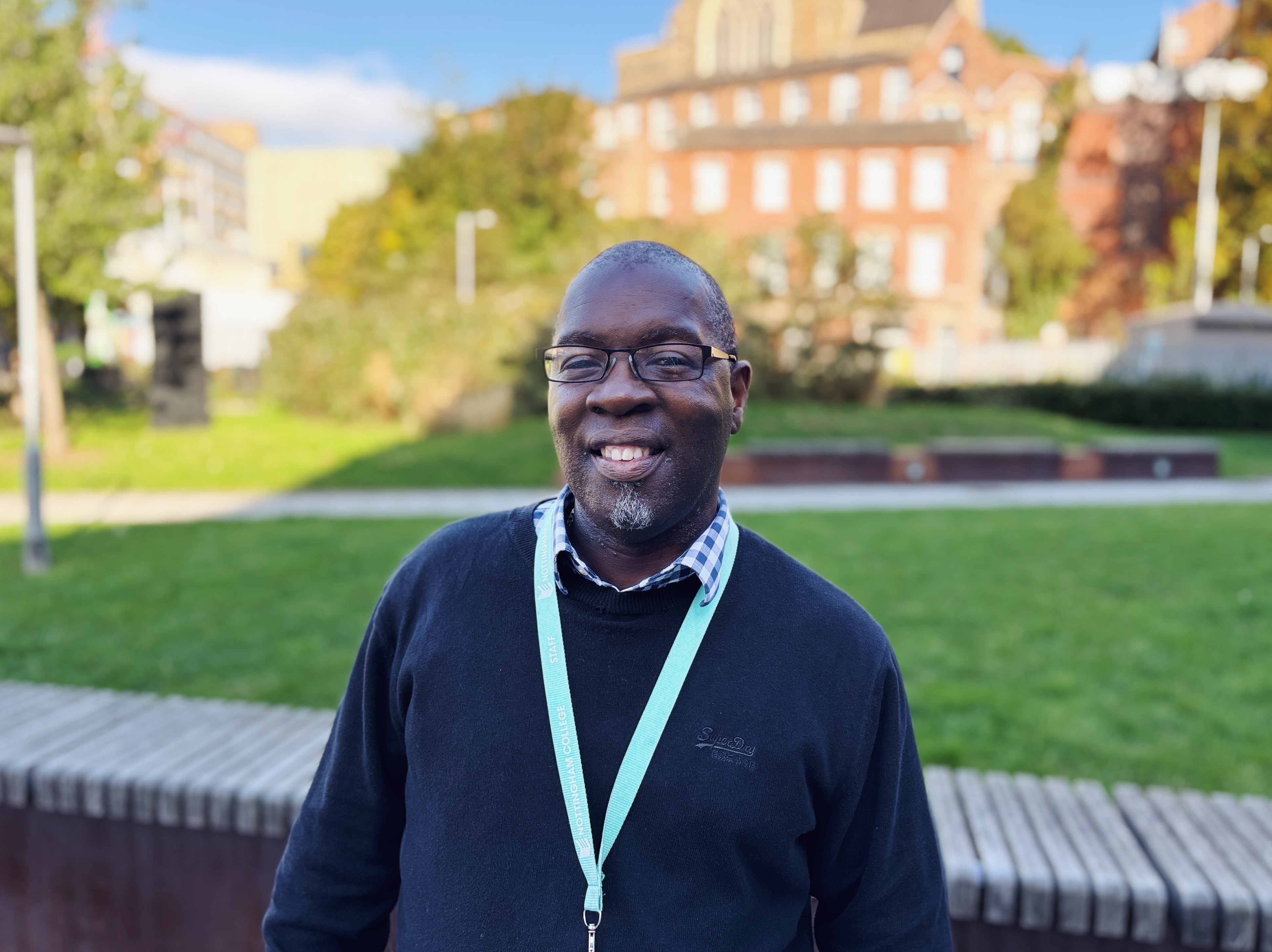 Horace Francis - Wellbeing mentore smiling at the camera outside the City Hub