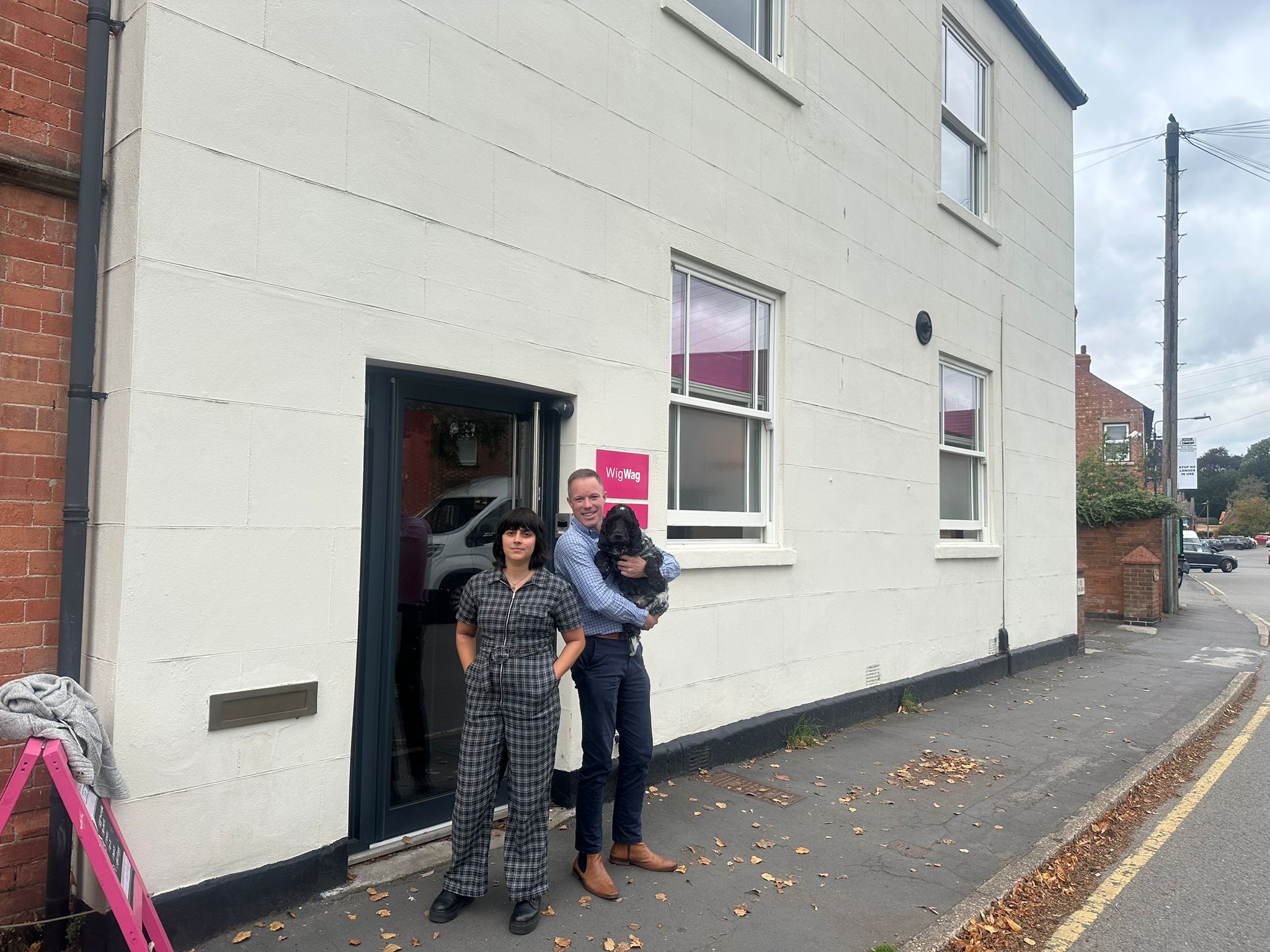 Jemima Kullar (left) Steve Ennis(right) with the office dog