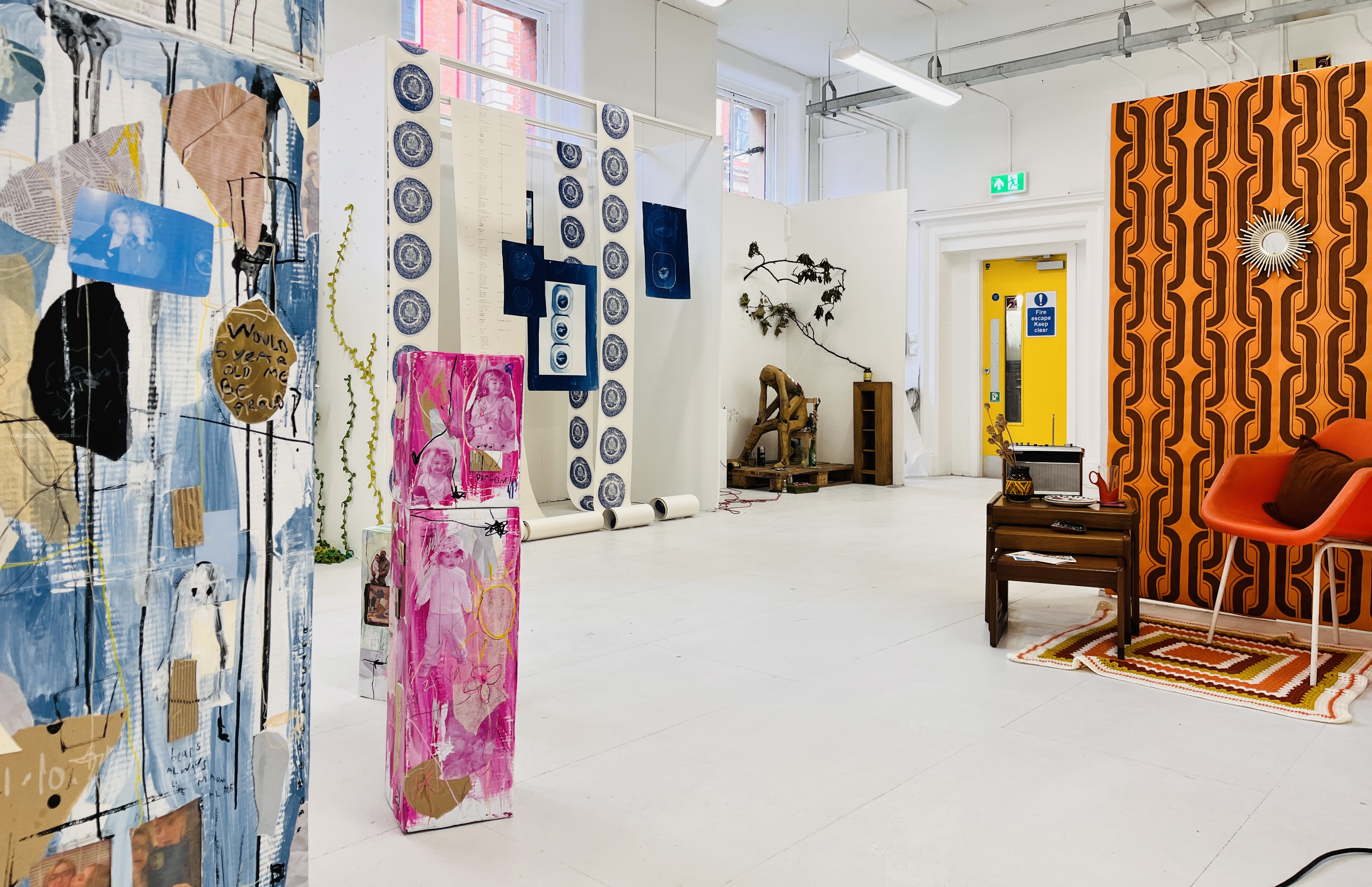 A room with student's art exhibitions in it