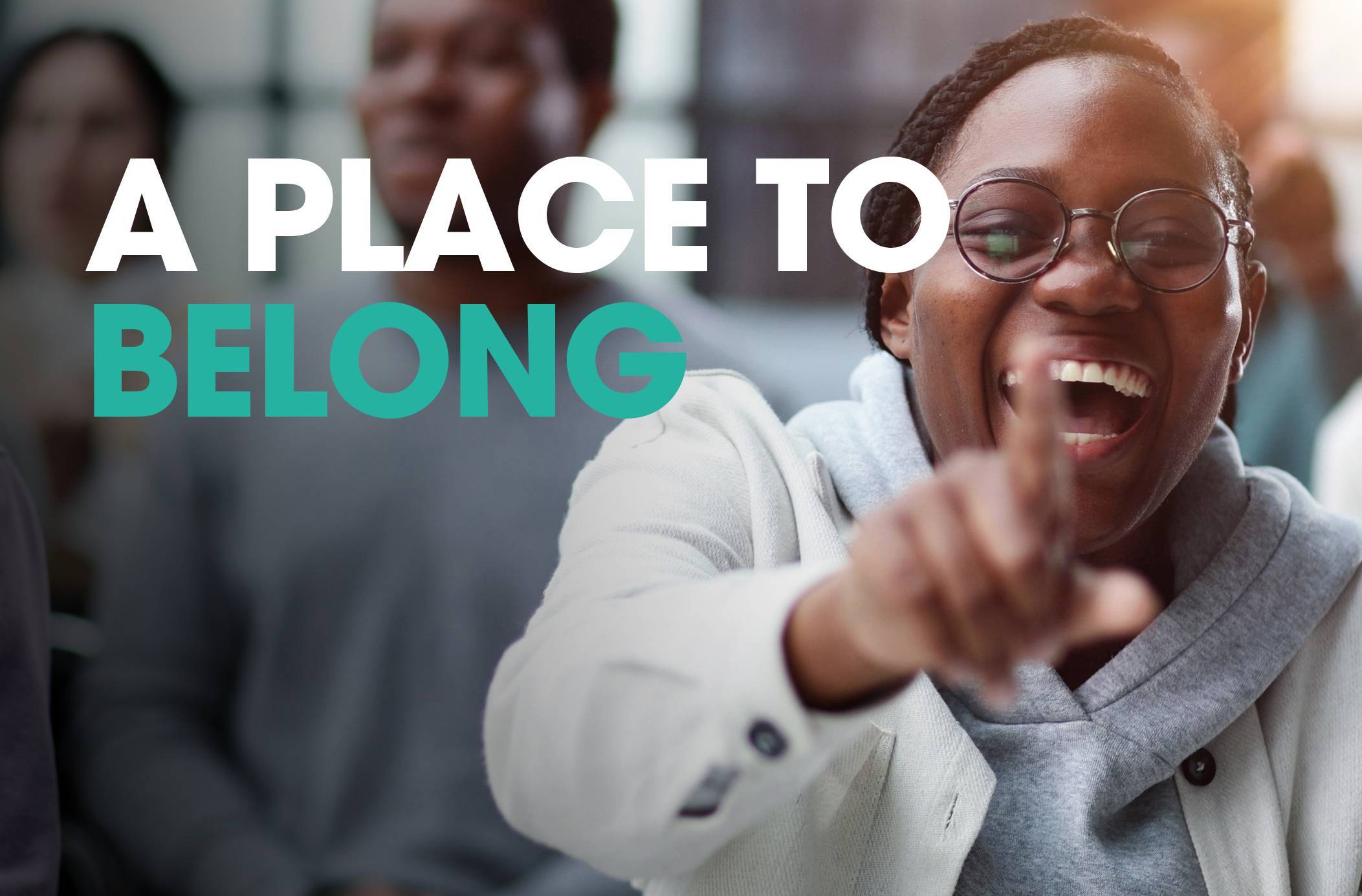 Text that says "a place to belong" and an image of a student.