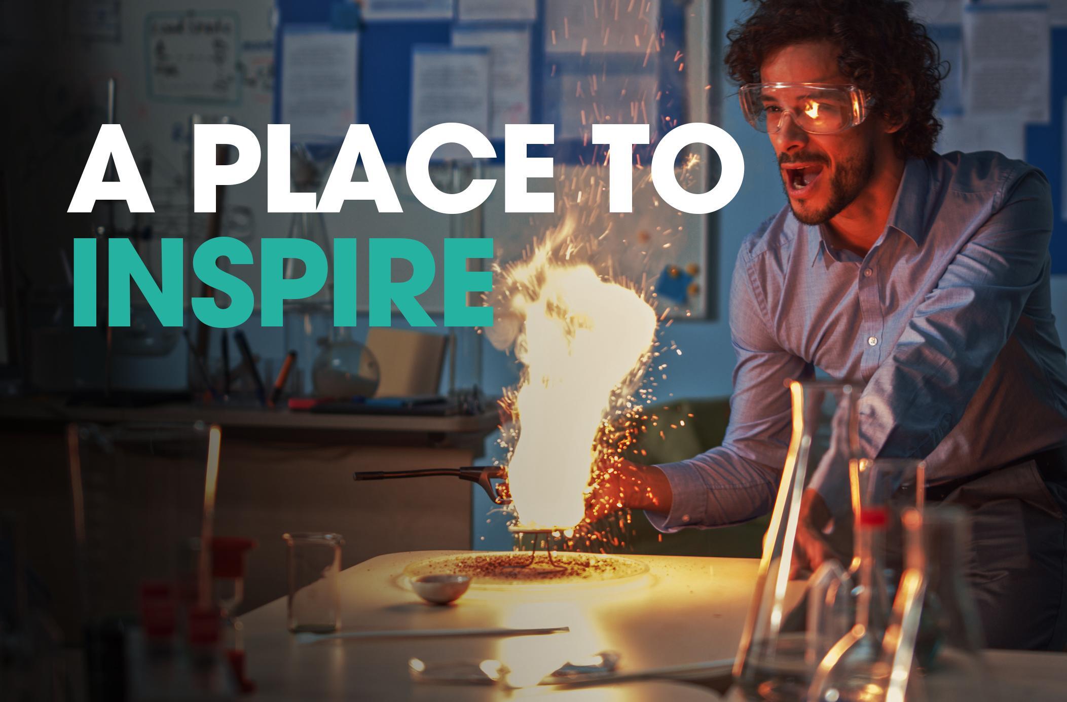 Text that says "a place to inspire" and a teacher in a classroom