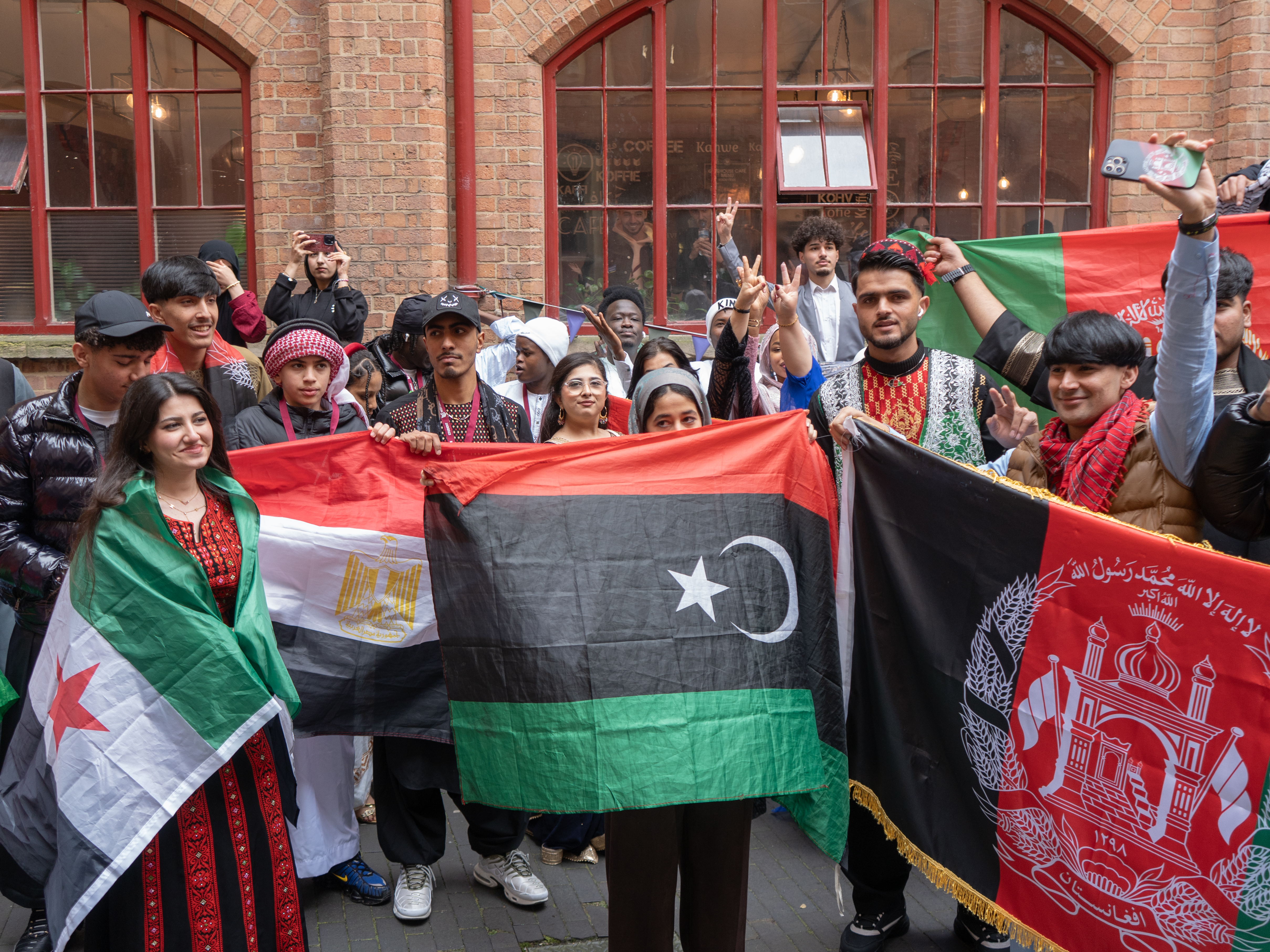 Adams - students posing with their national flags