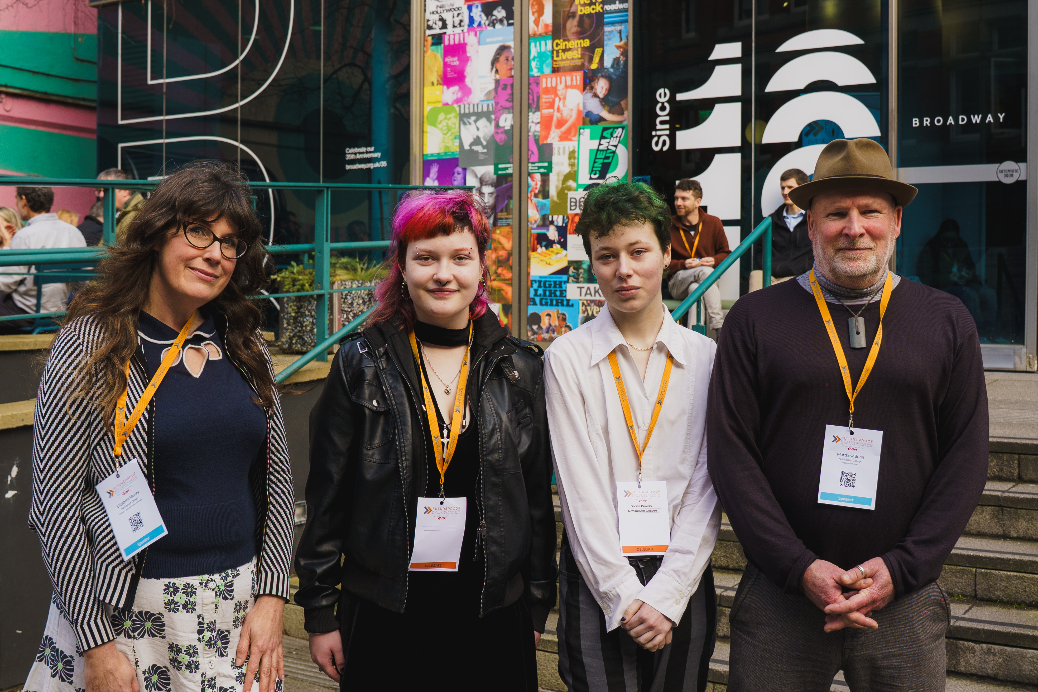 Liz, Matt and students in stand together in front of Broadway Cinema.