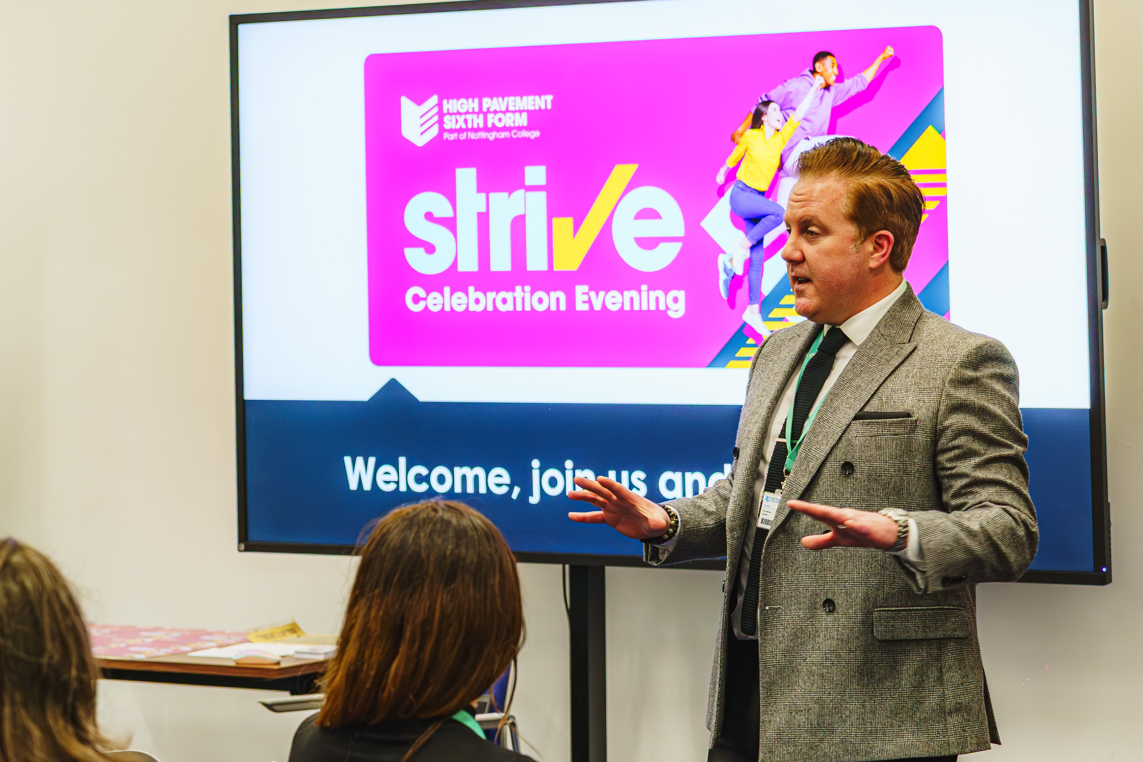 Nottingham College team member delivering Strive graduation presentation