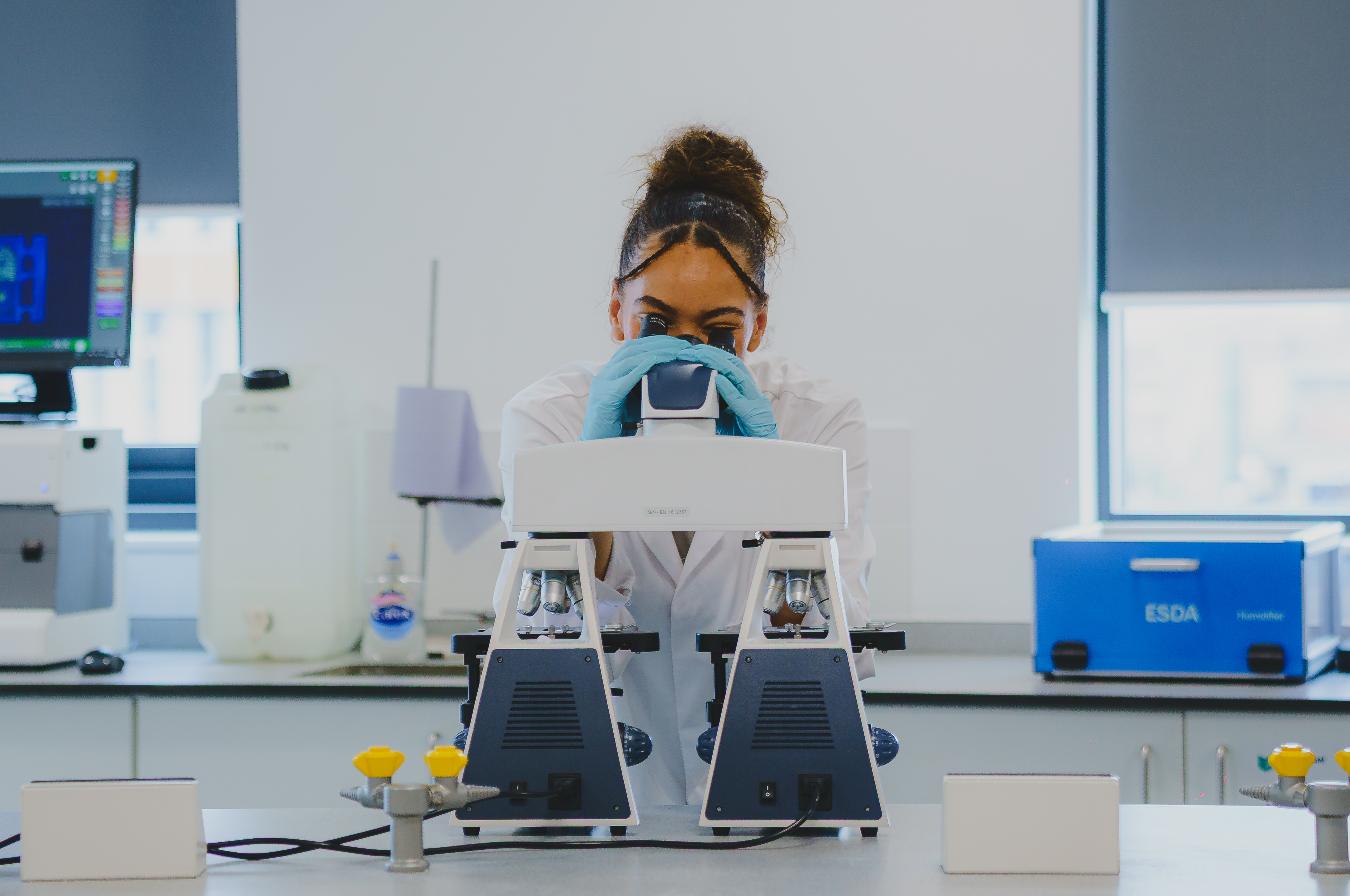 Forensic Science Student, Fait, using equipment in lab.
