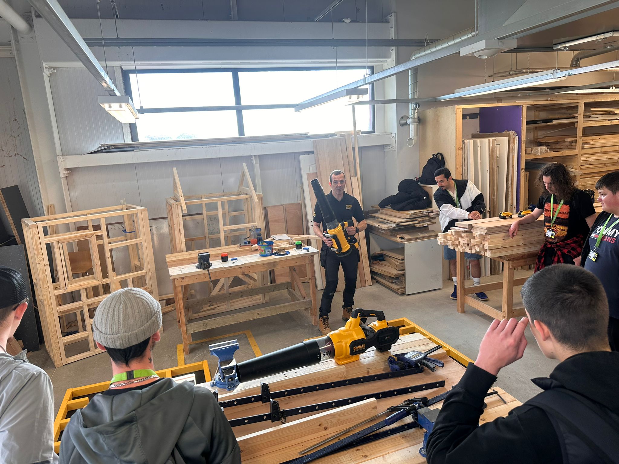 DeWalt trainers demonstrating and displaying equipment