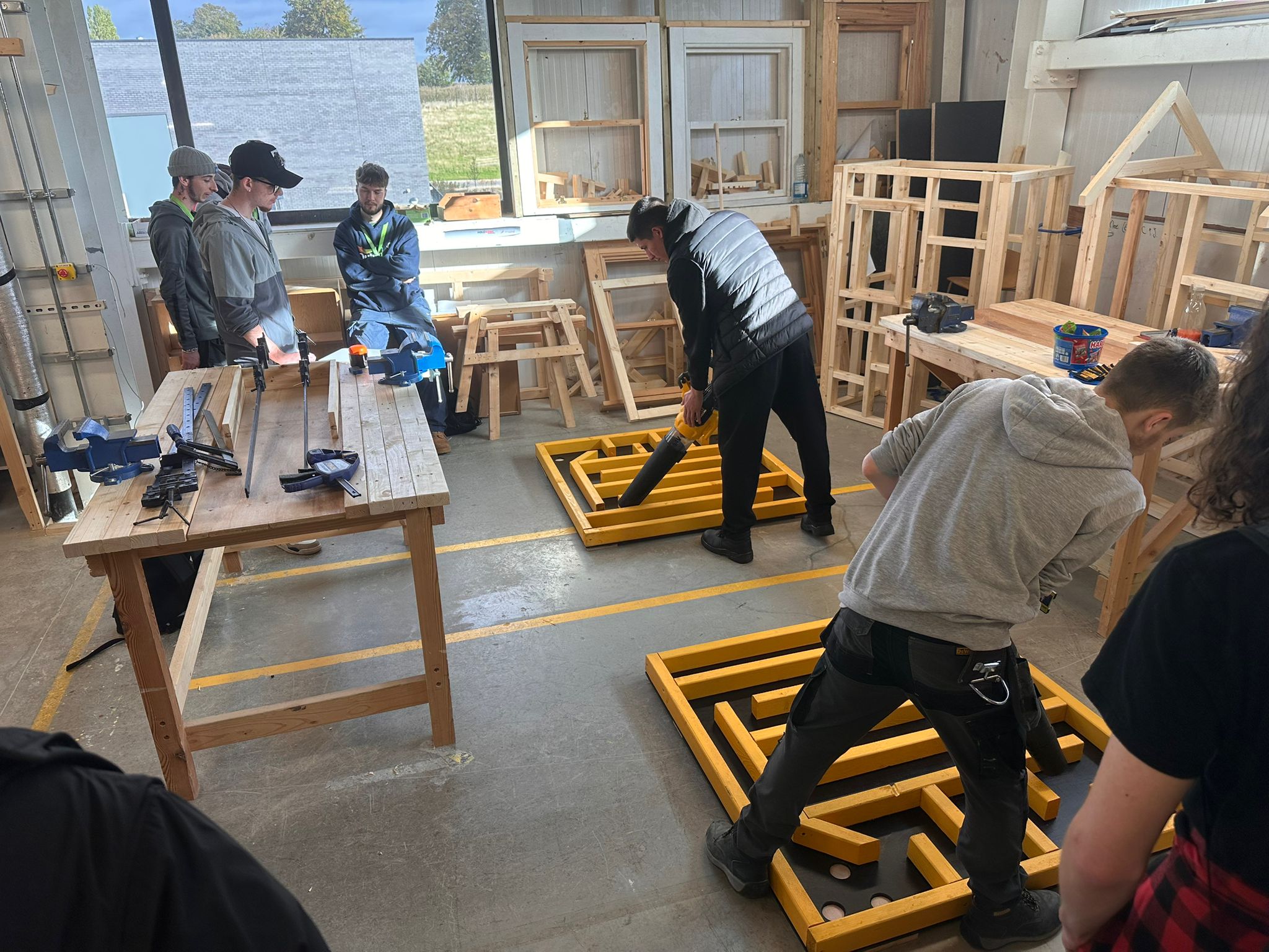 DeWalt trainers demonstrating and displaying equipment