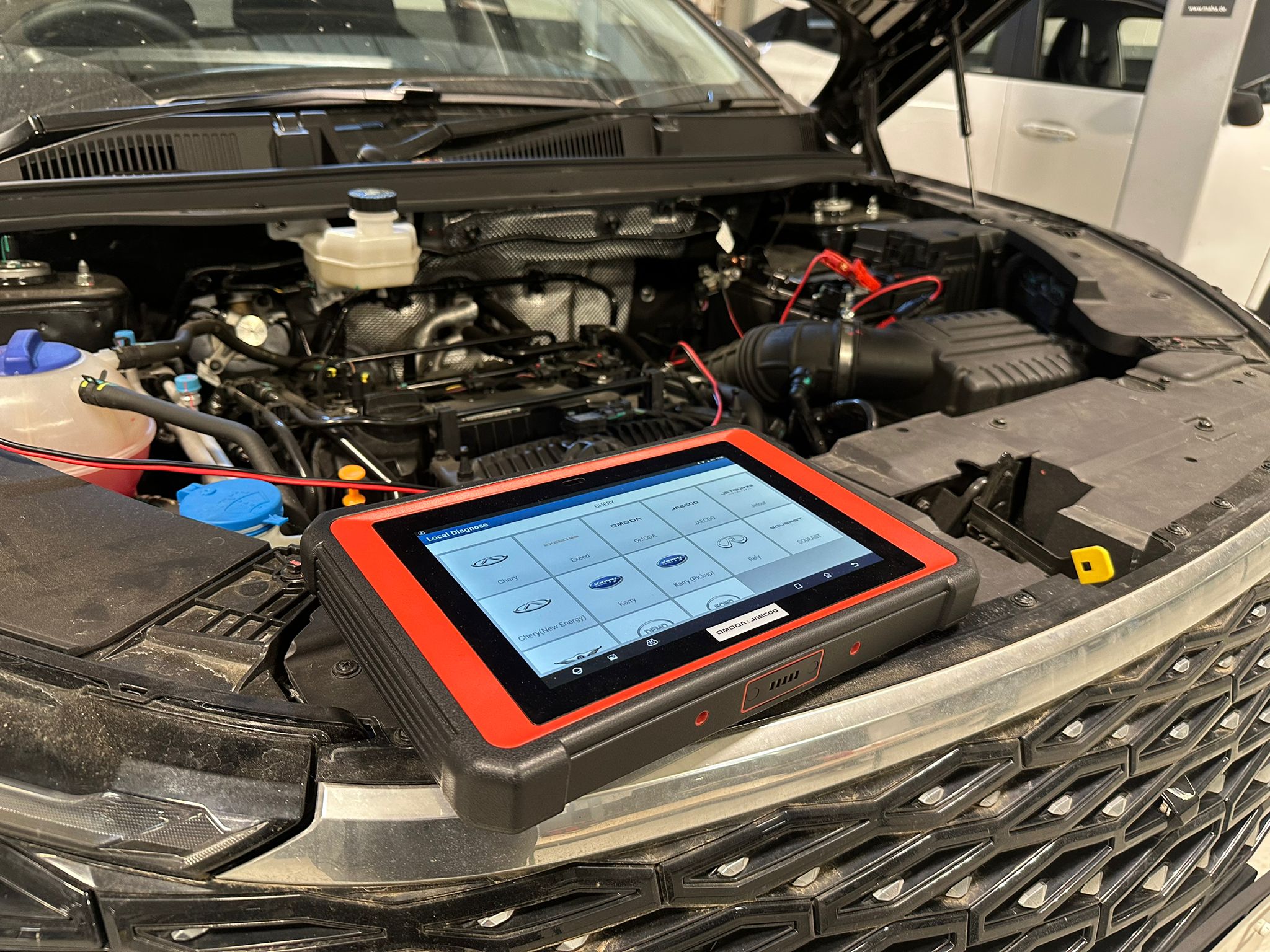 Tablet hooked up to an electric motor