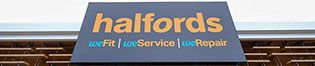 A photograph of a Halfords sign.