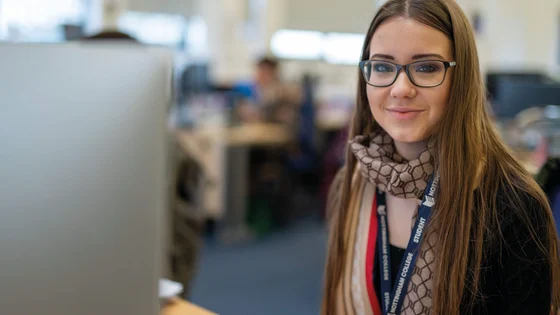 Female Nottingham College student using a computer.