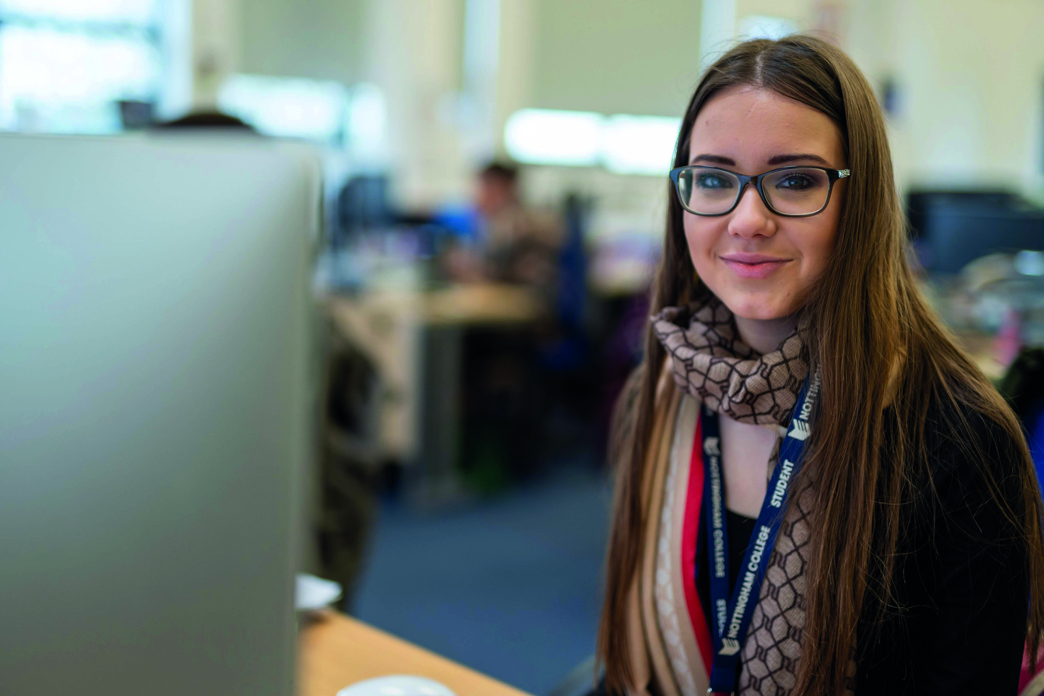 Female Nottingham College student using a computer.