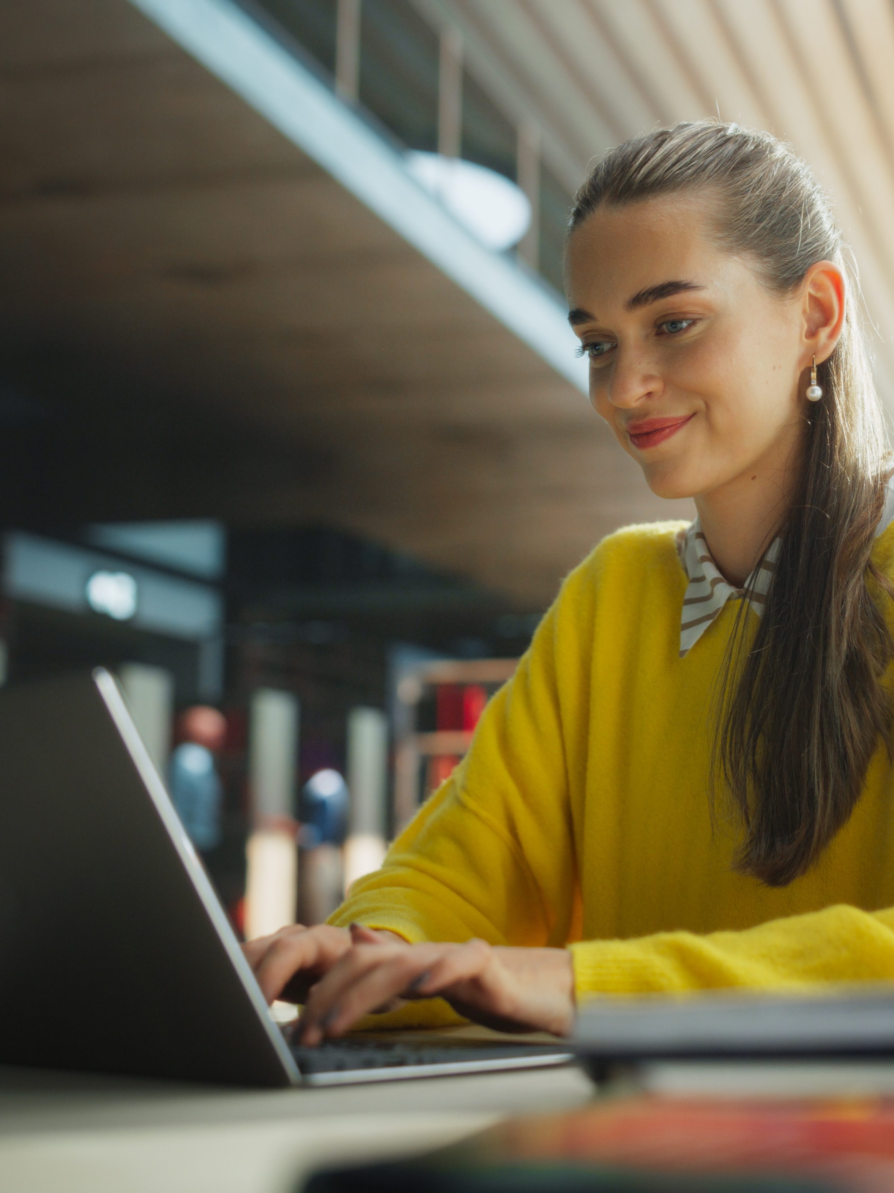 Female student on a laptop