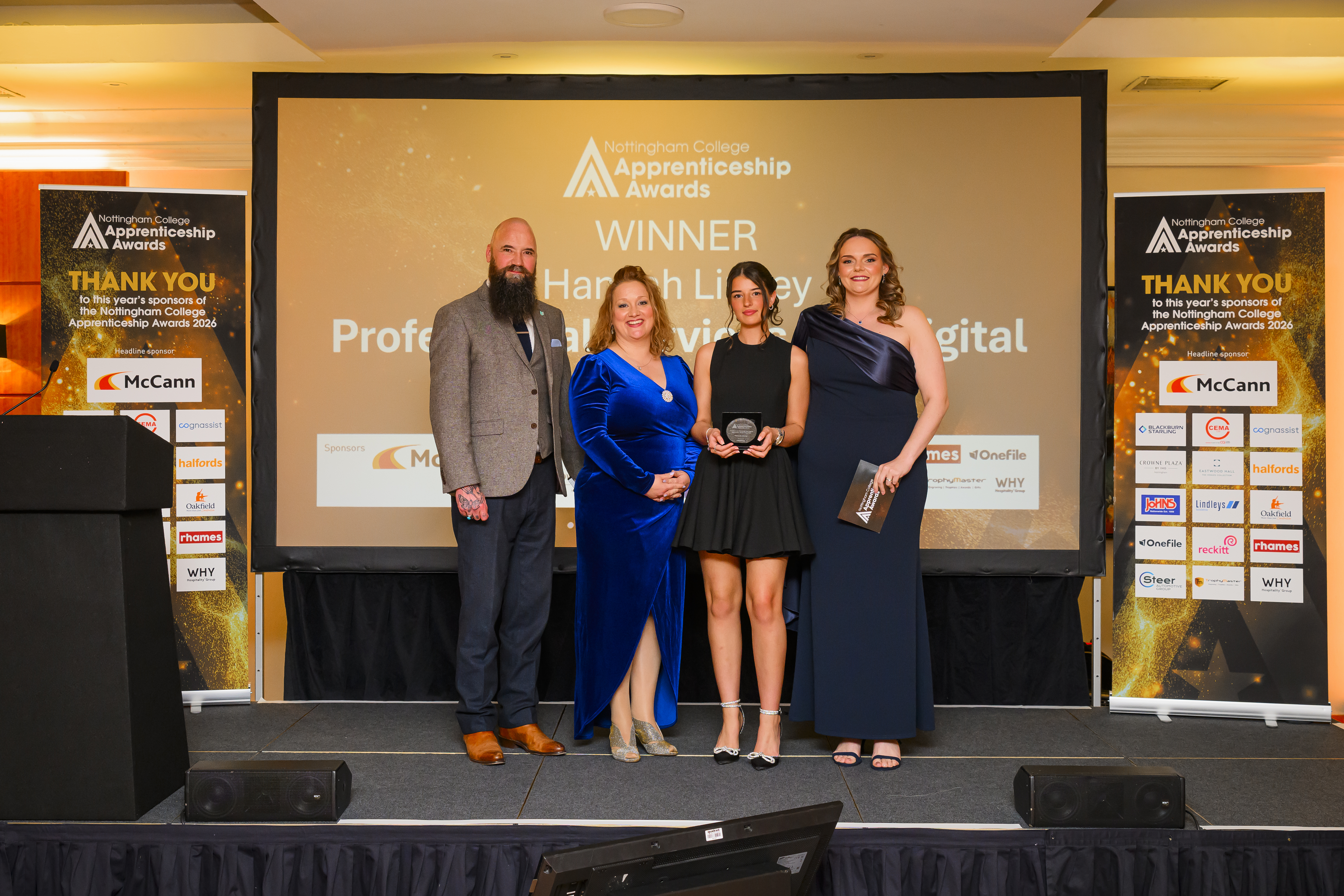 Hannah Linney on stage receiving award