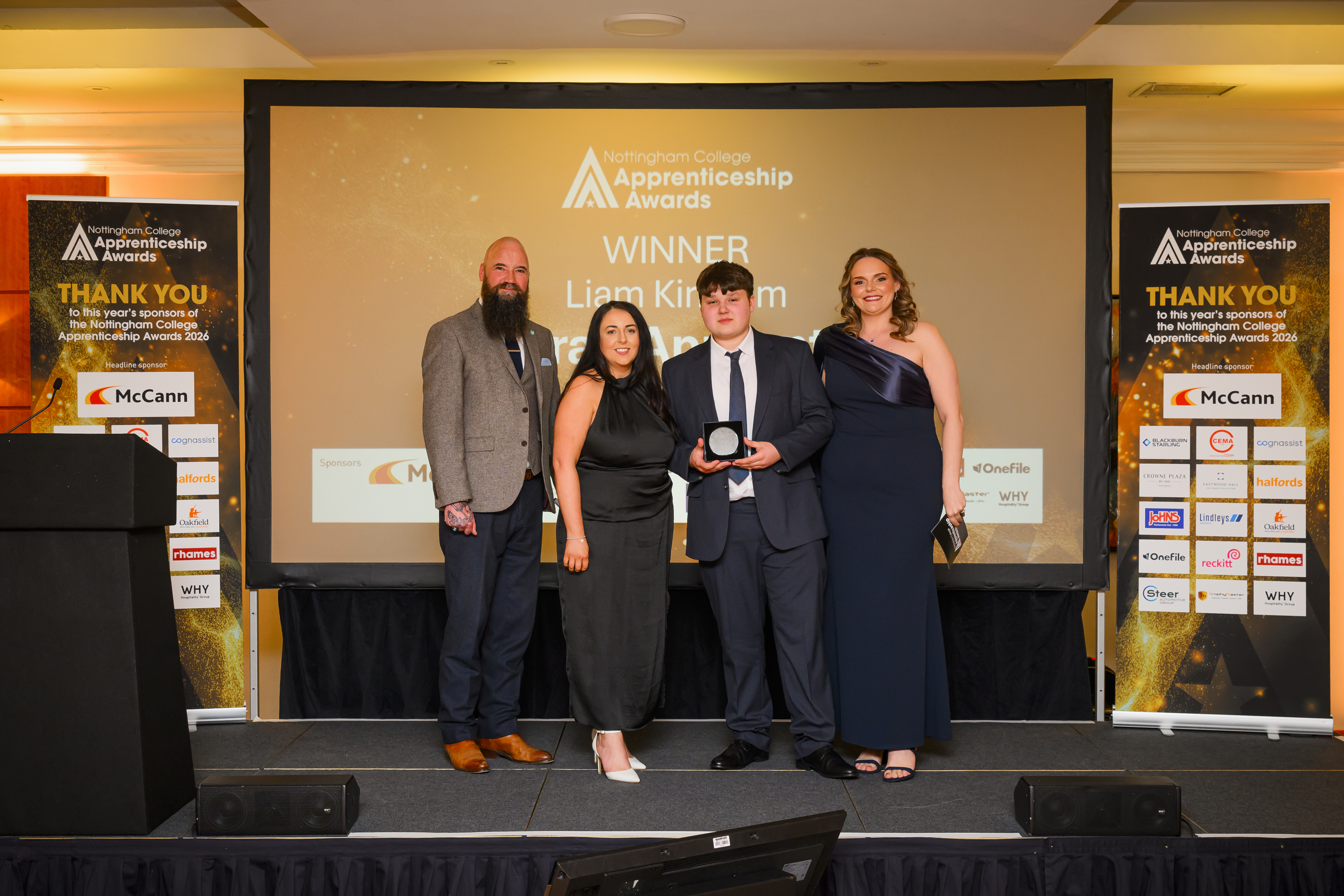 Liam Kirkham receiving award