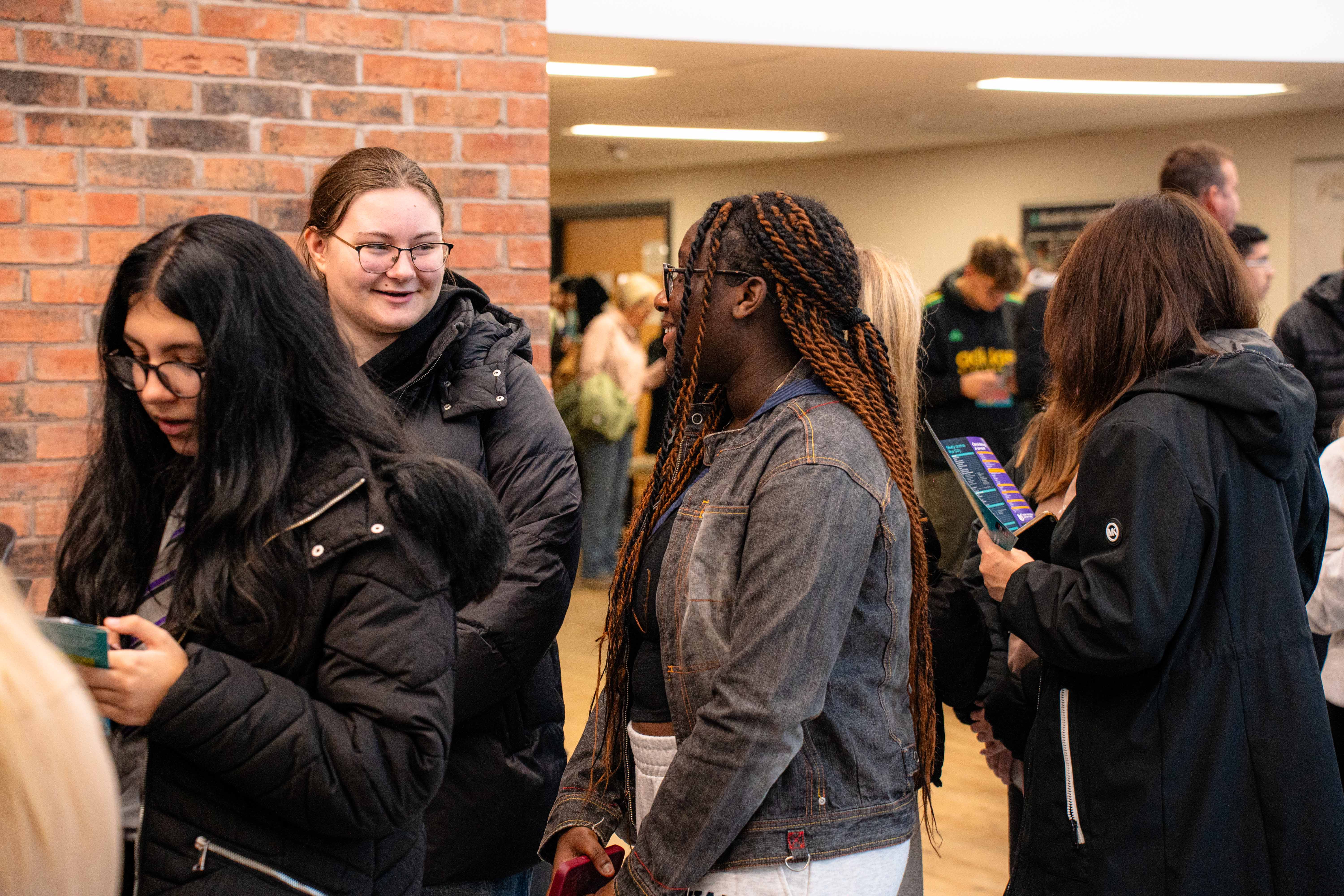 Visitors at an Open Evening at City Hub