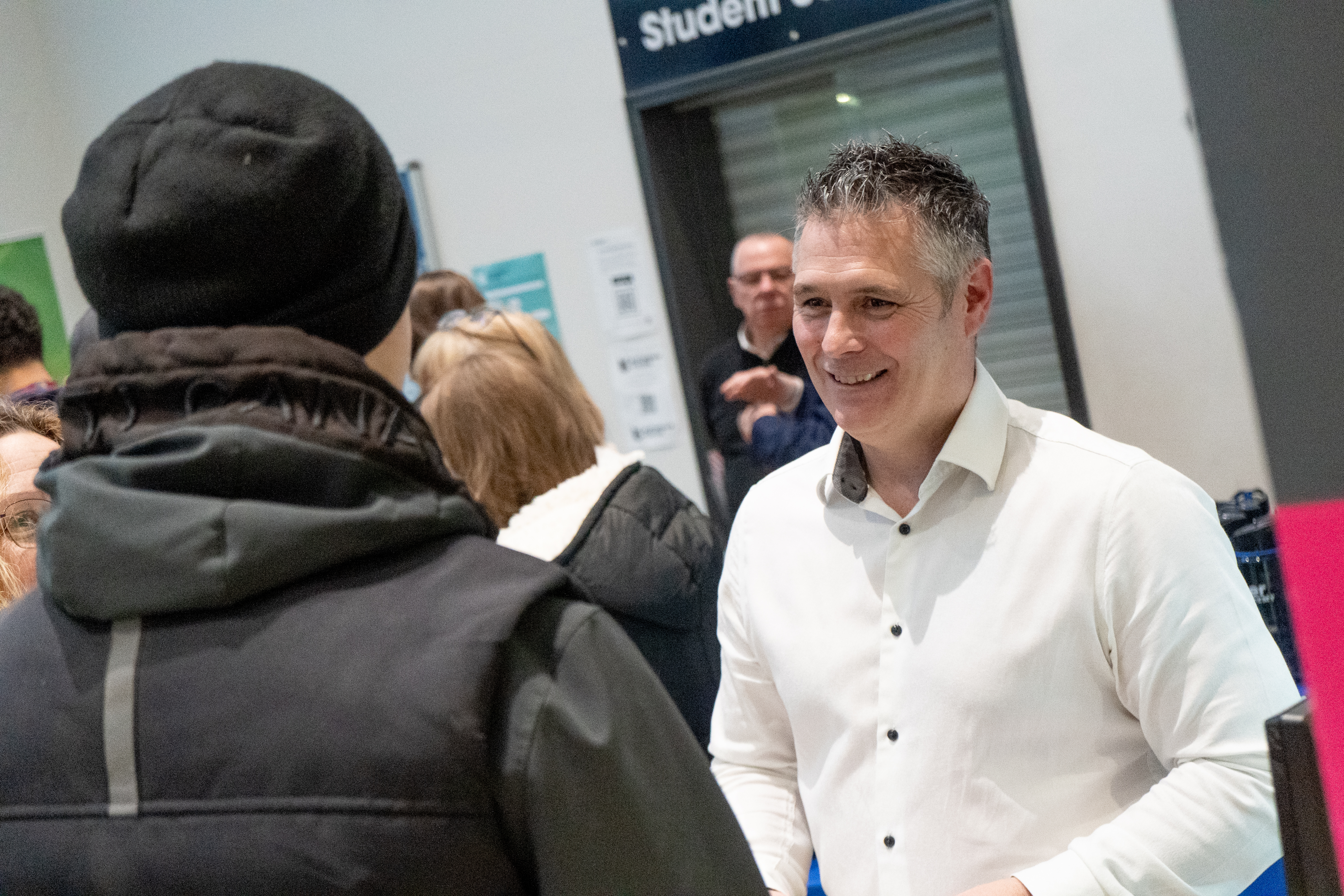 Employer speaking to a guest