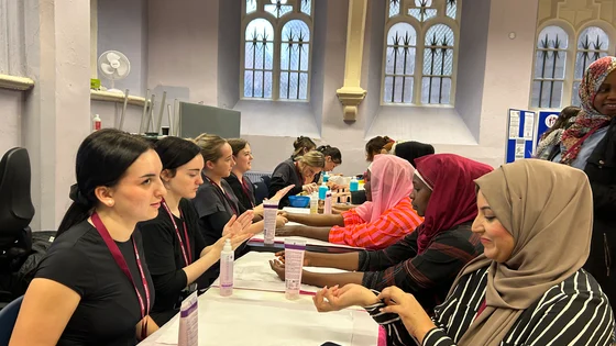 Hair and Beauty students giving beauty treatments to students