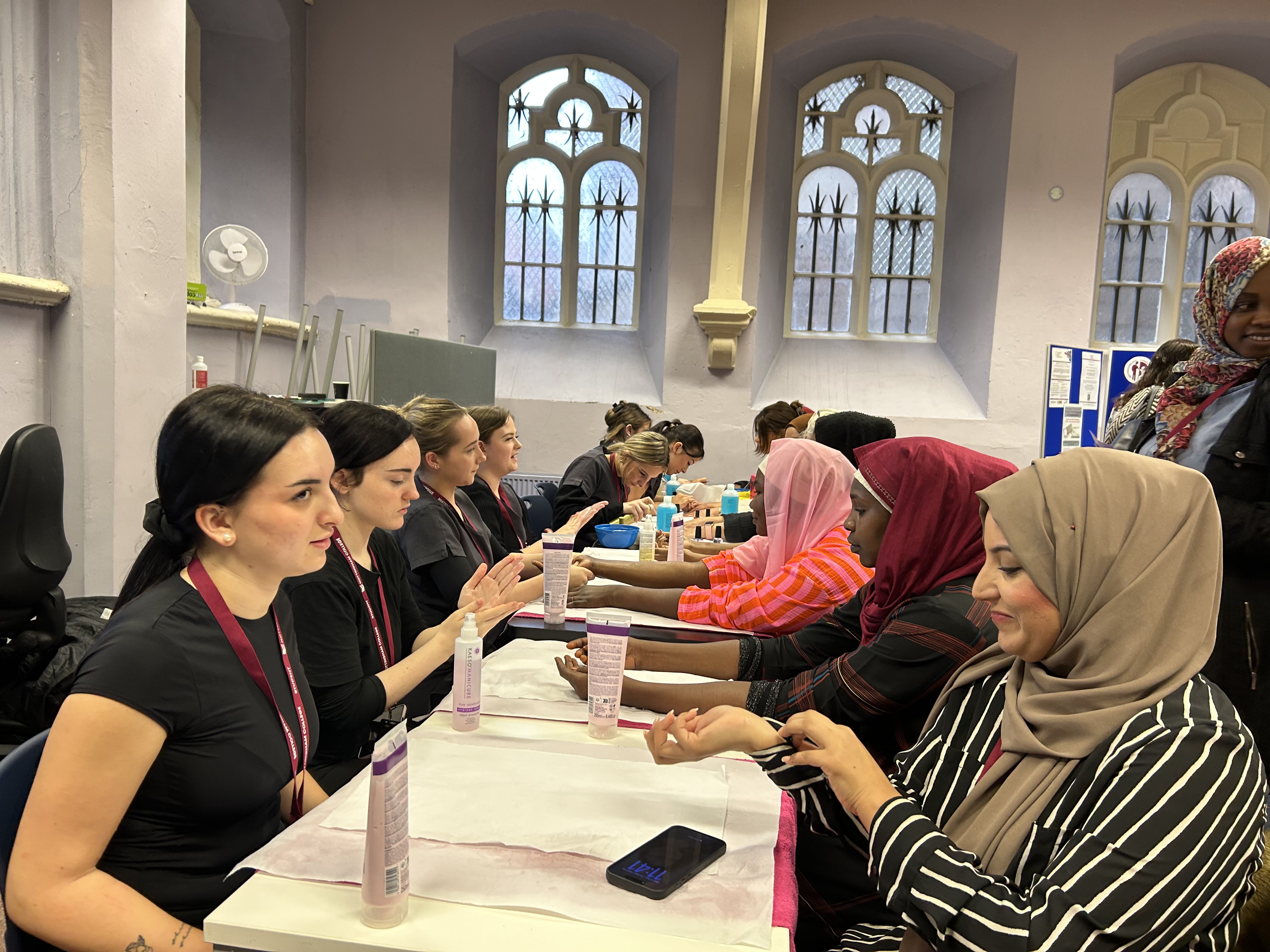 Hair and Beauty students giving beauty treatments to students