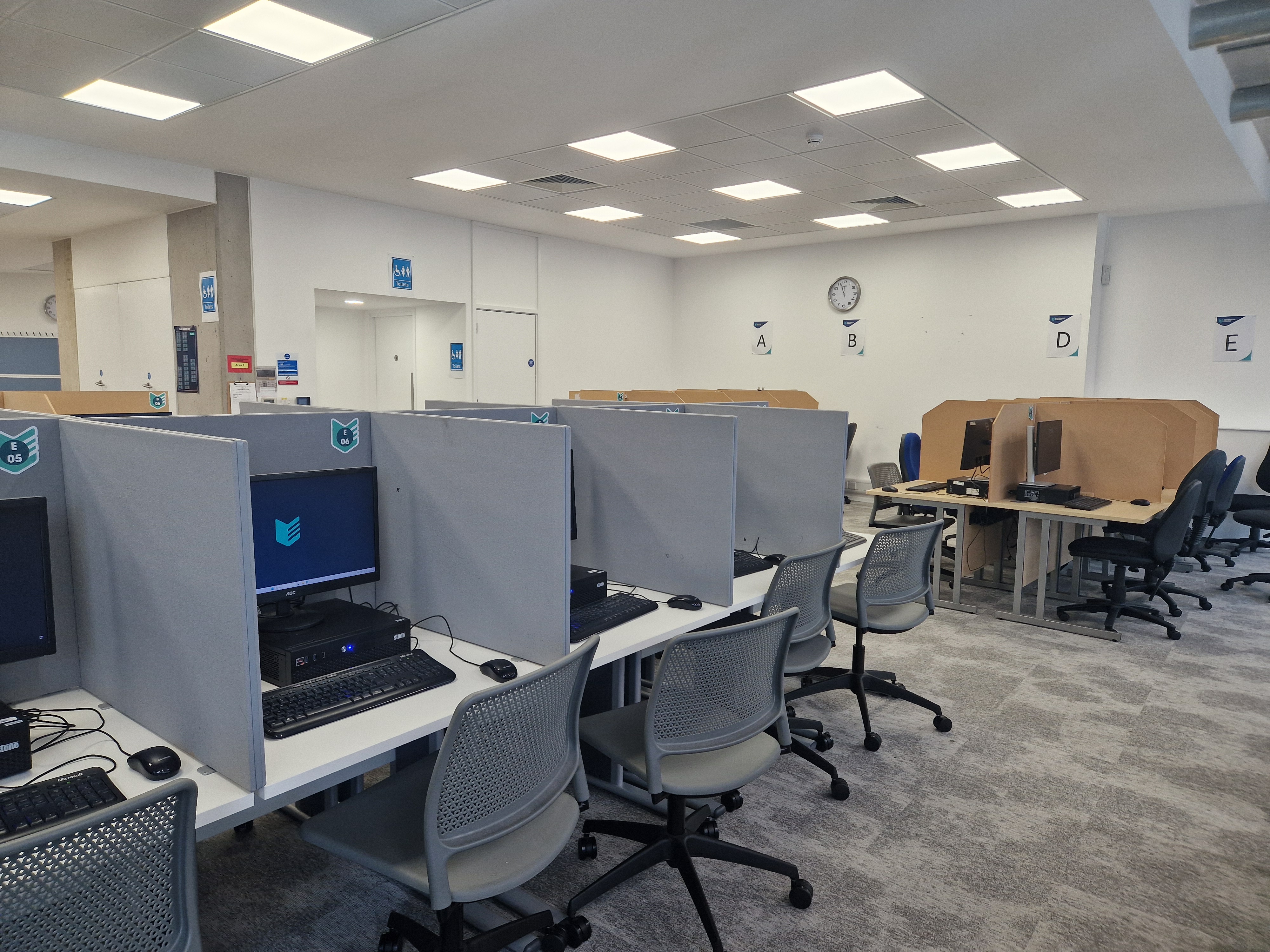 Computer desks for online exams.