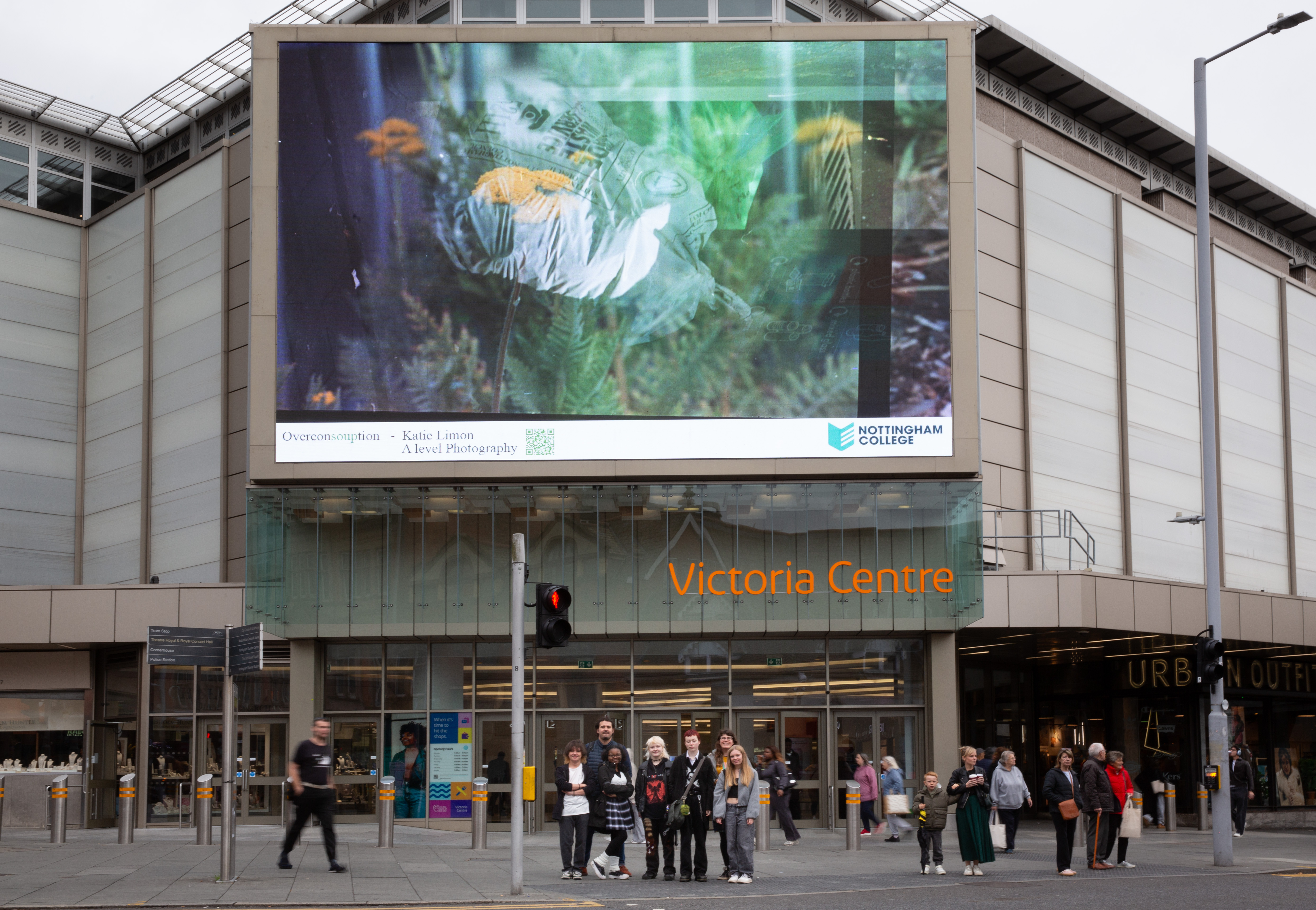 Jazz Furber, Nigella Israel, Katie Limon, Ollie Wood and Dorian Powers with tutor Danny Rawling outside the Vic Centre displaying their images