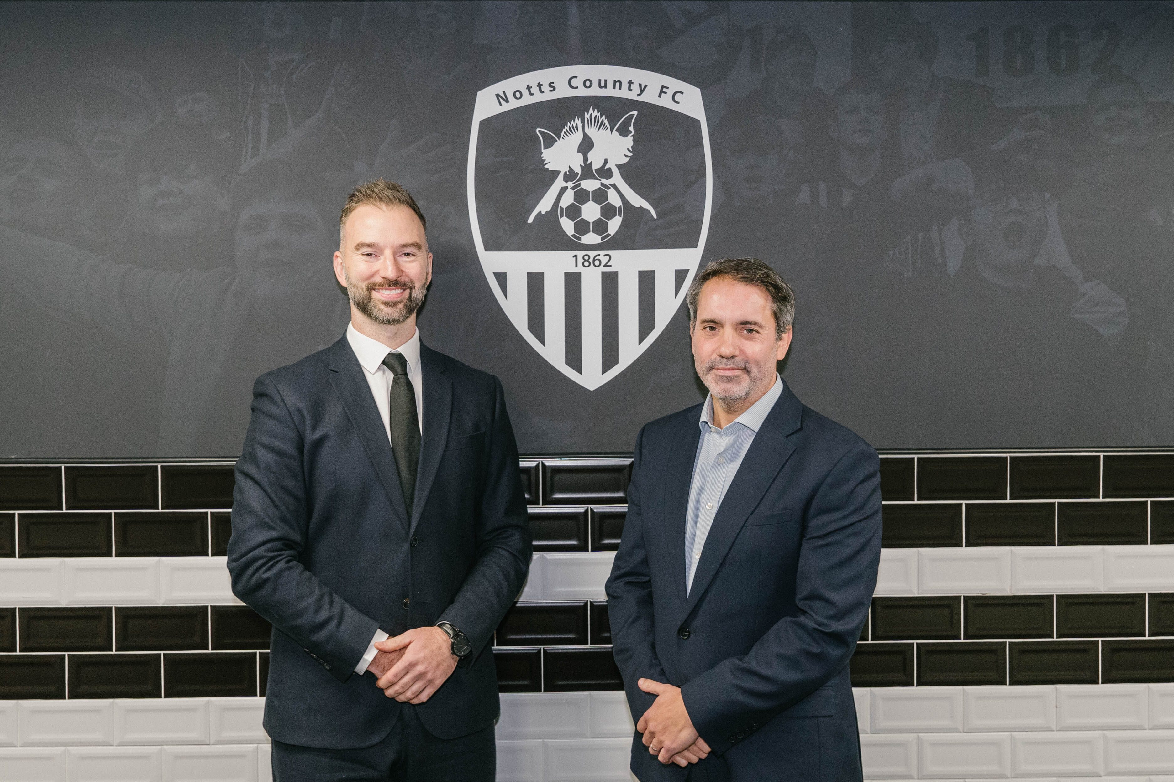 Two members of staff at the Notts County Ground.