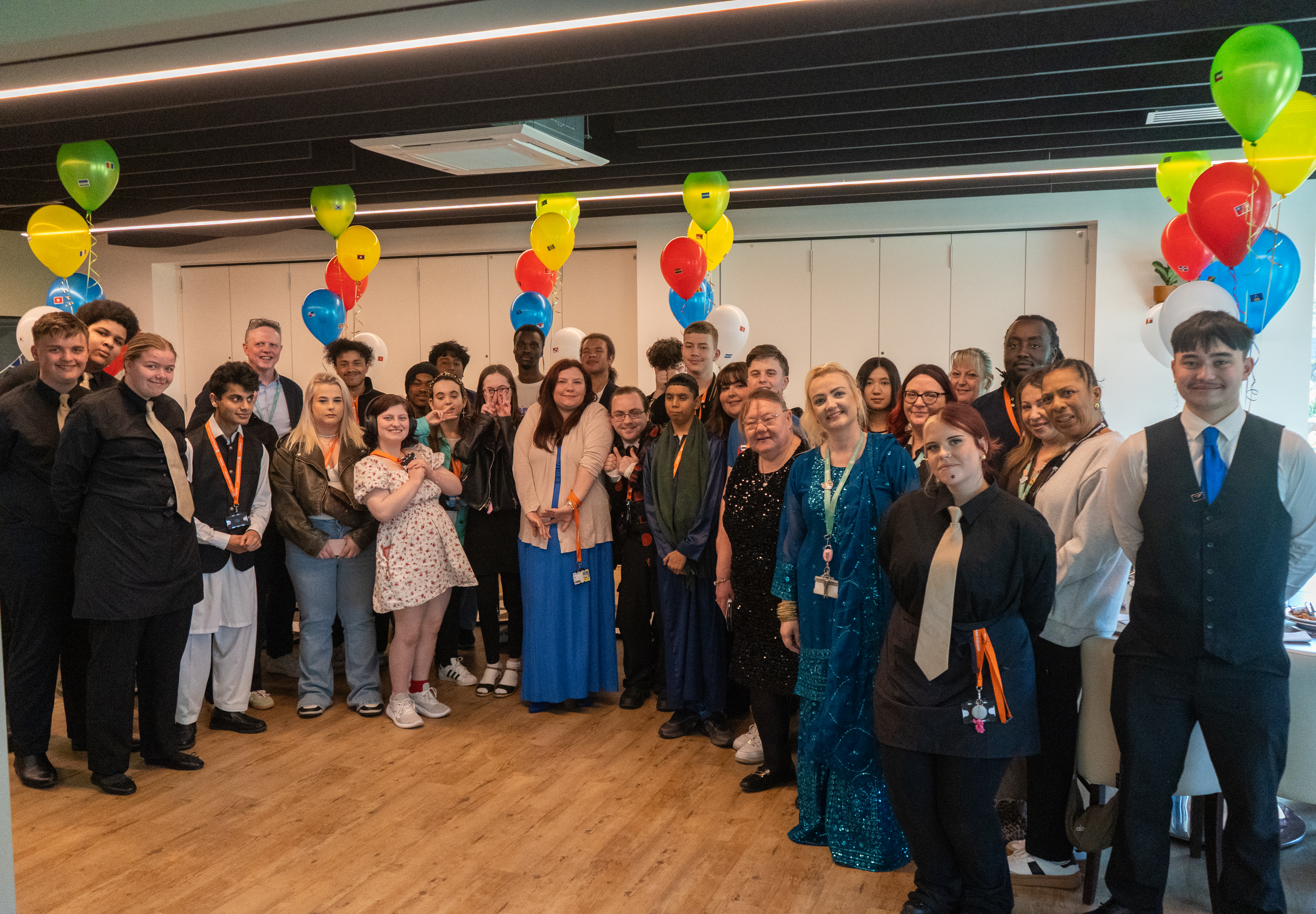 Foundation learning staff and students with Hospitality students.