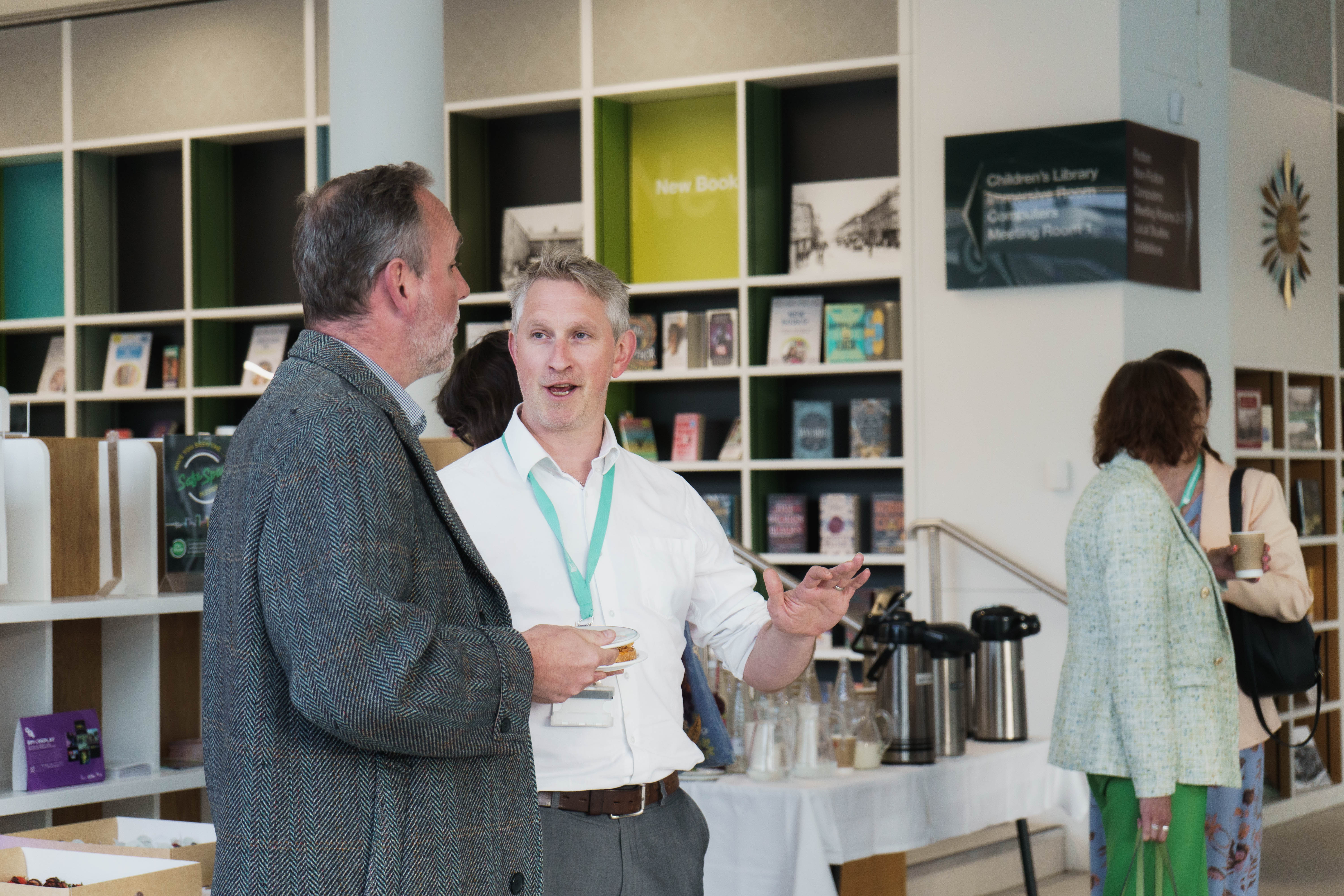 Member of Sam talking to an attendee