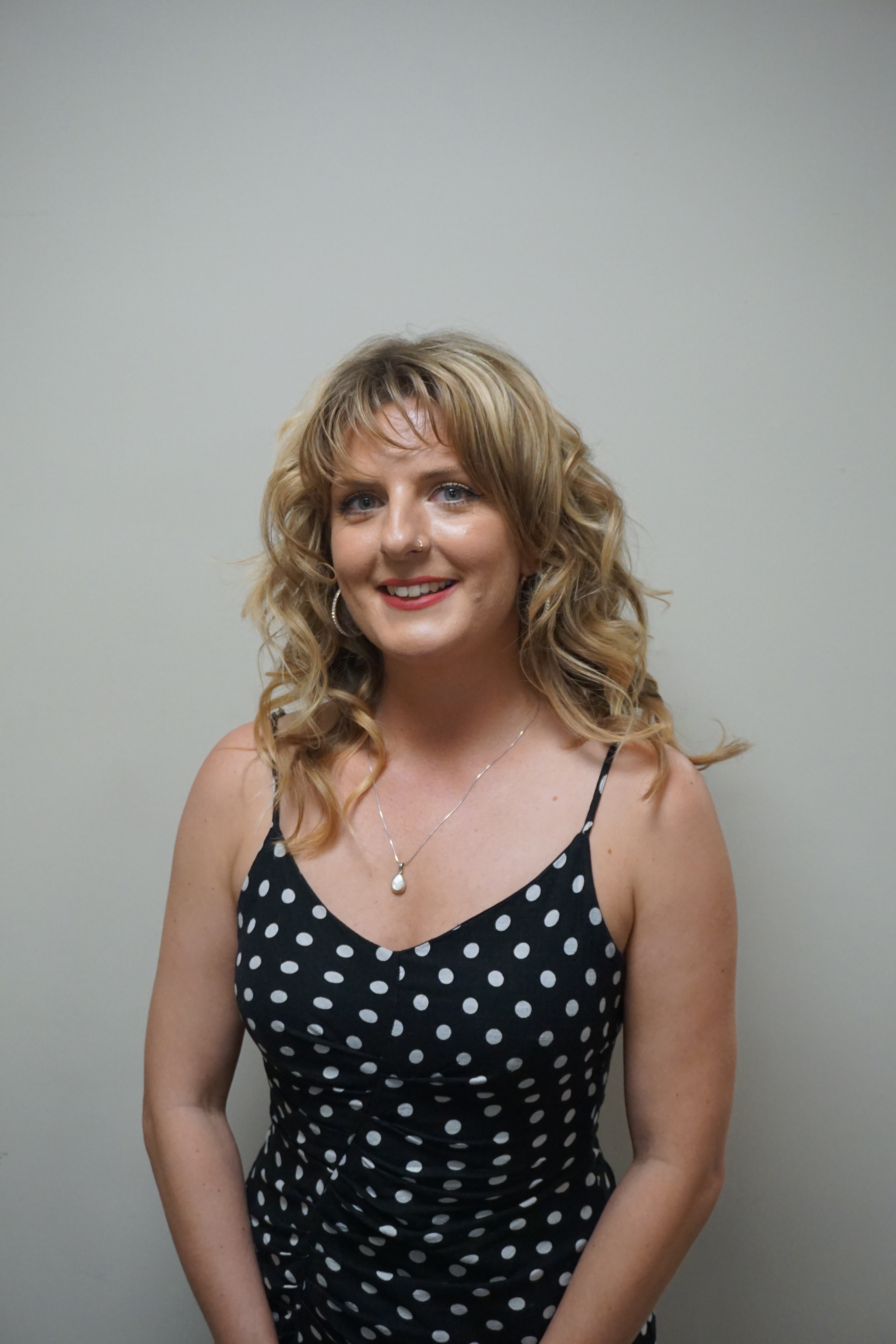 Daisy Duggan smiling at the camera