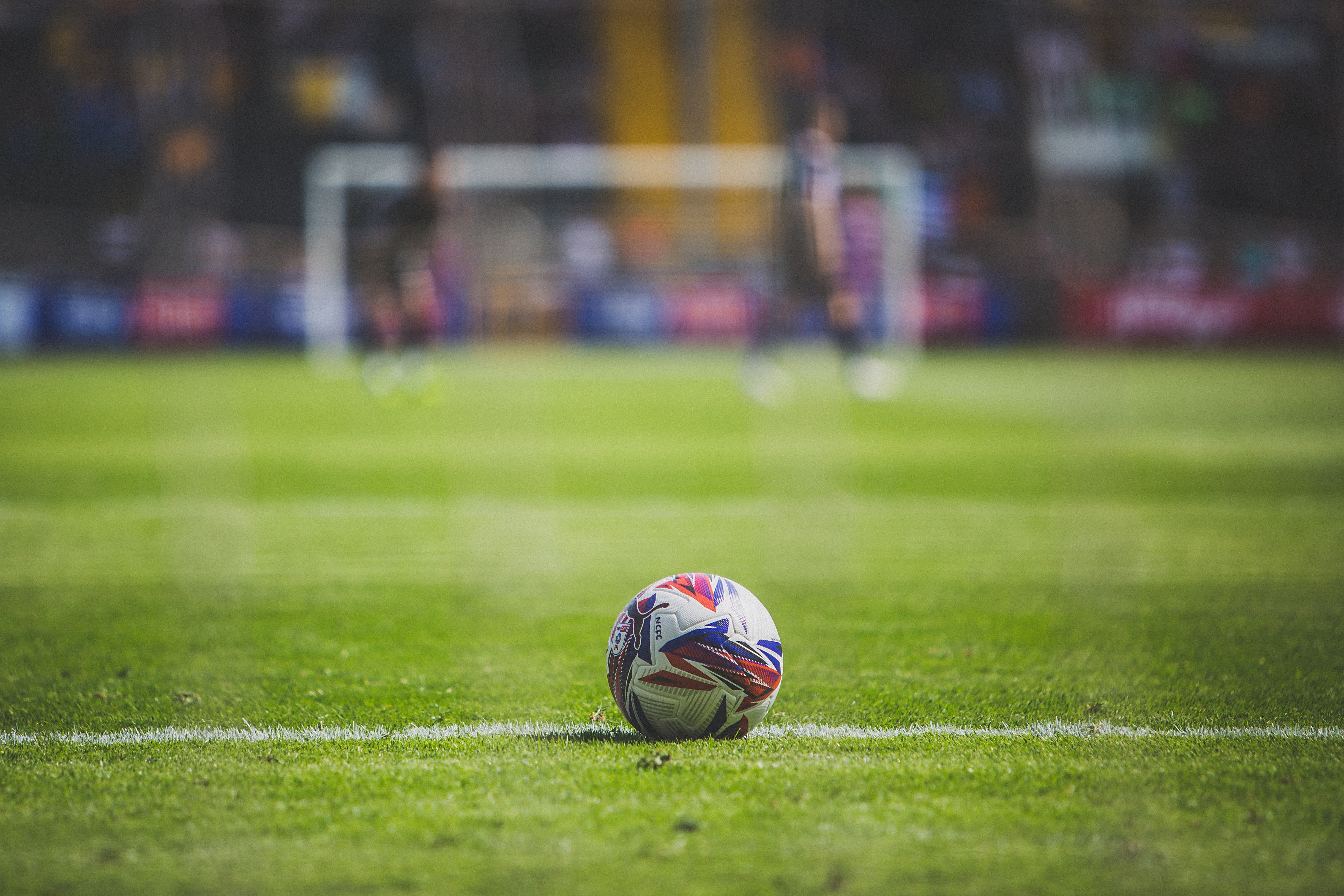 A football in the middle of the pitch