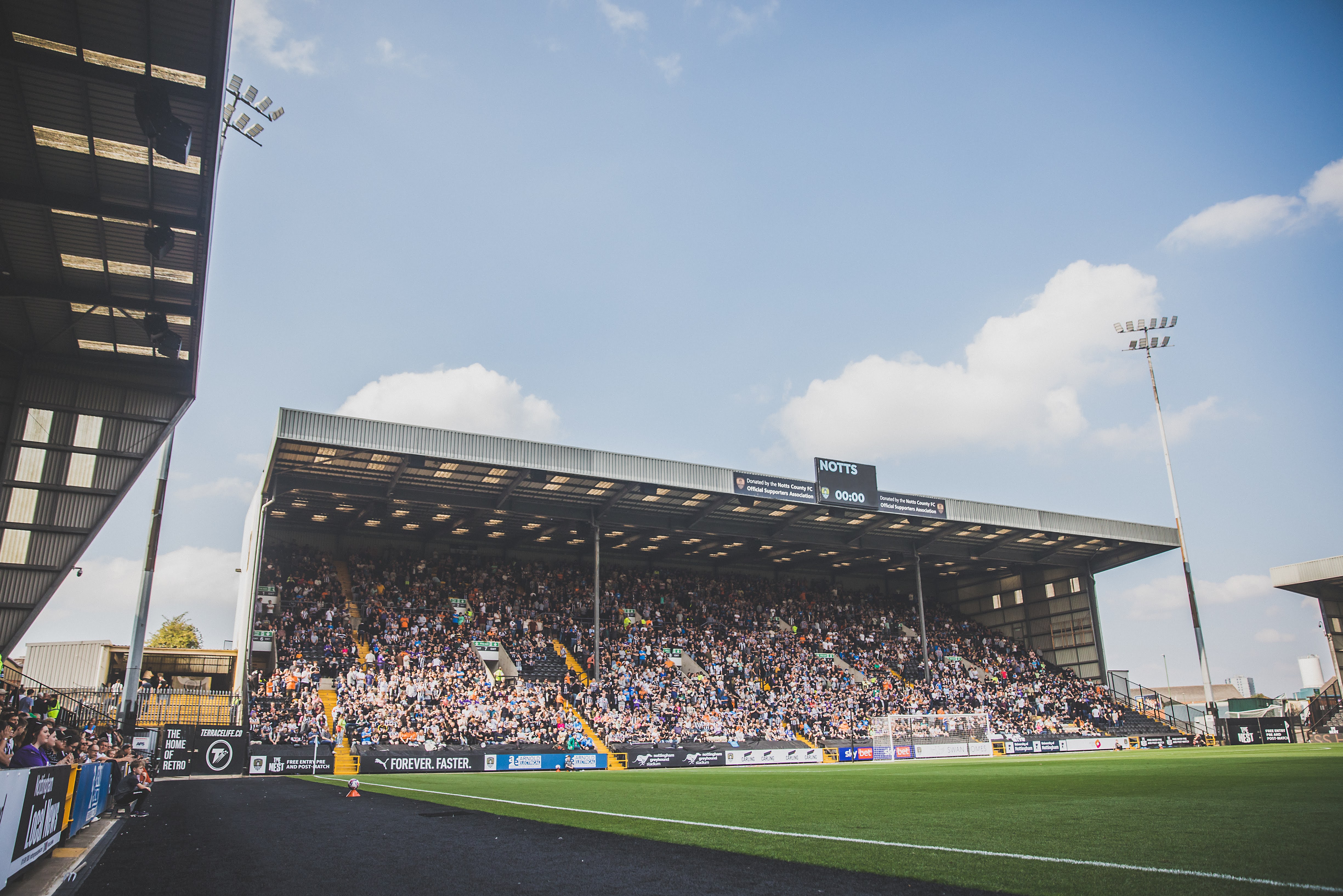 A stadium full of fans watching football
