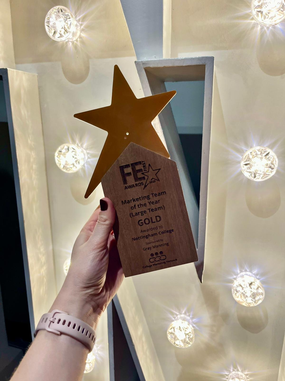 Gold award - gold trophy with a star on top