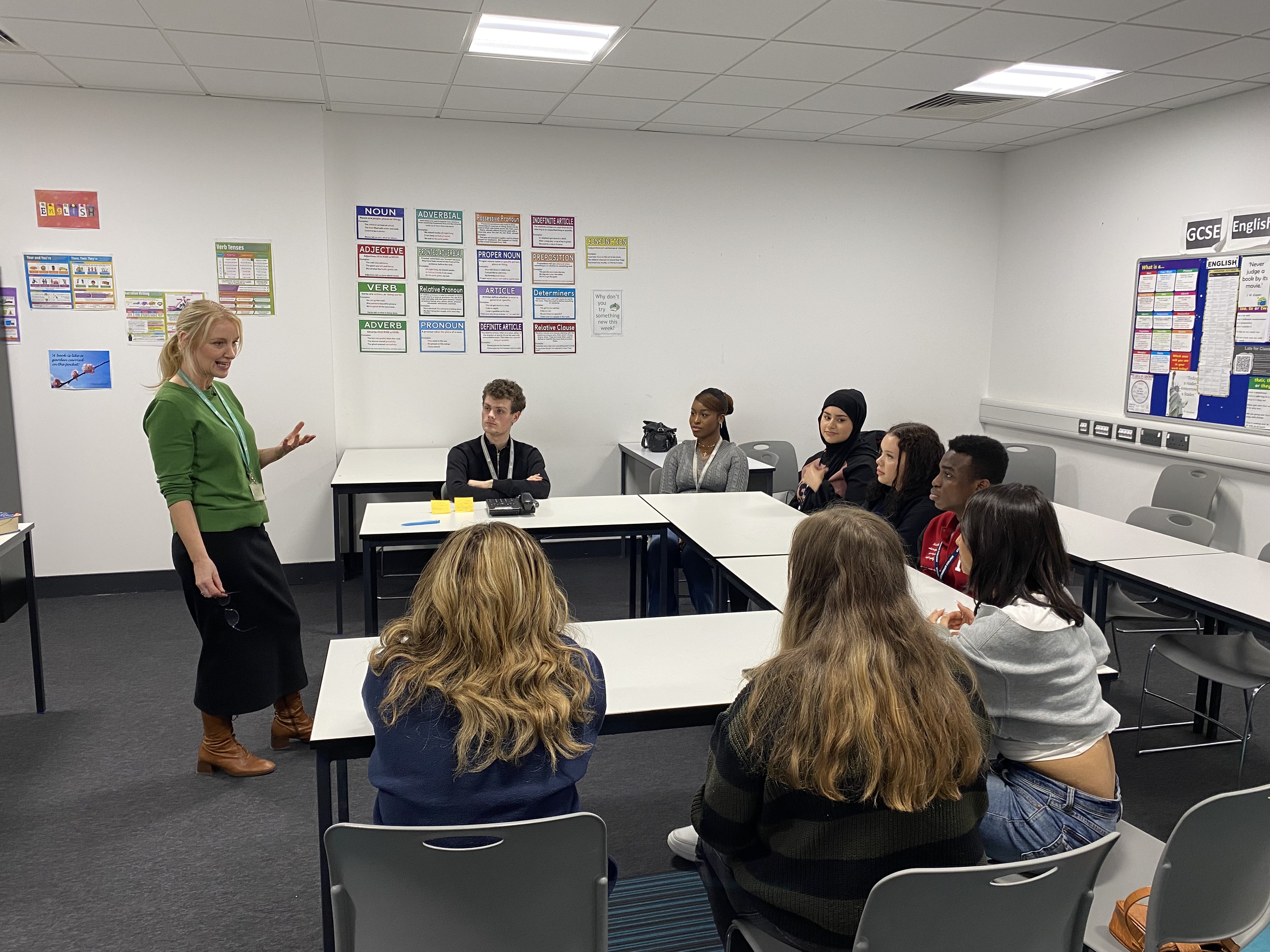 Liz Baxter speaking to students in a classroom