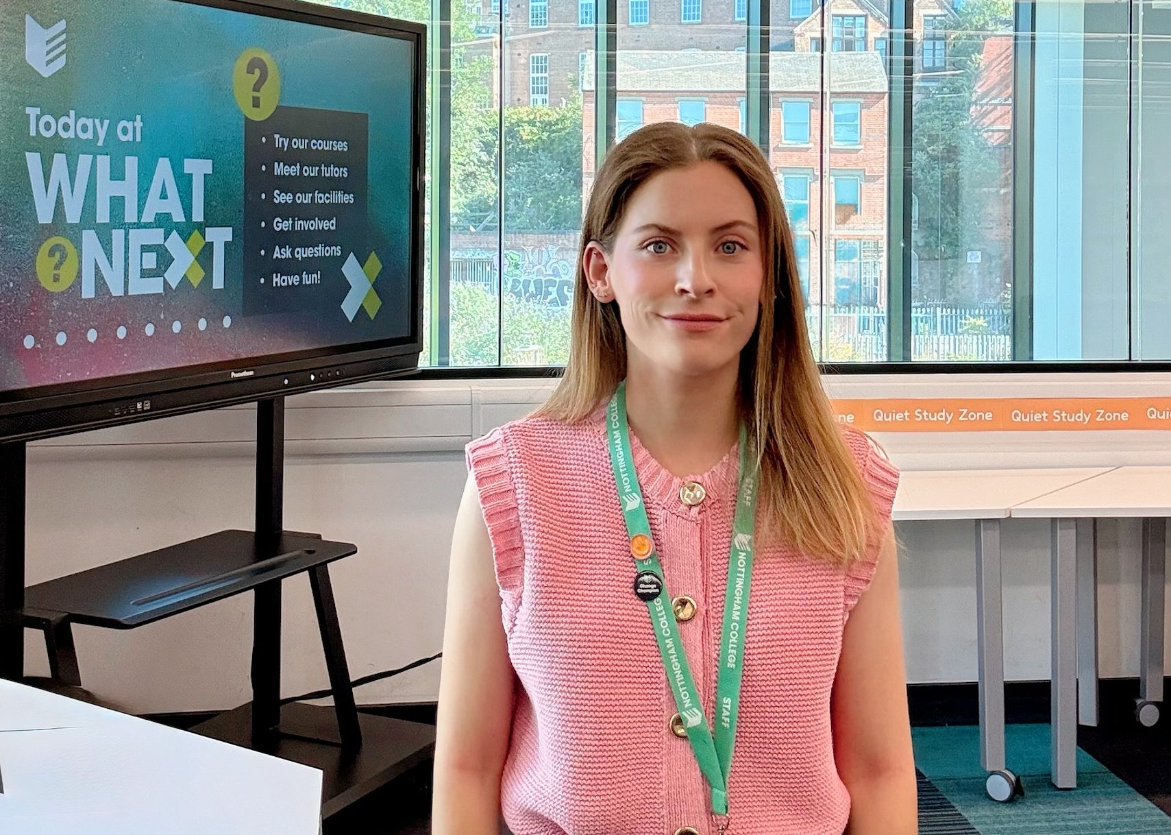 Staff member presenting a presentation at a school event