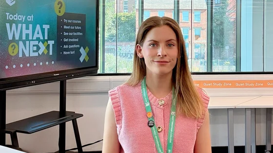 Staff member presenting a presentation at a school event