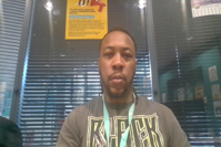 Member of staff smiling