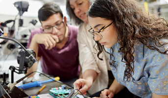 Students working in an engineering workshop