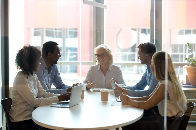 Staff in a meeting at the City Hub